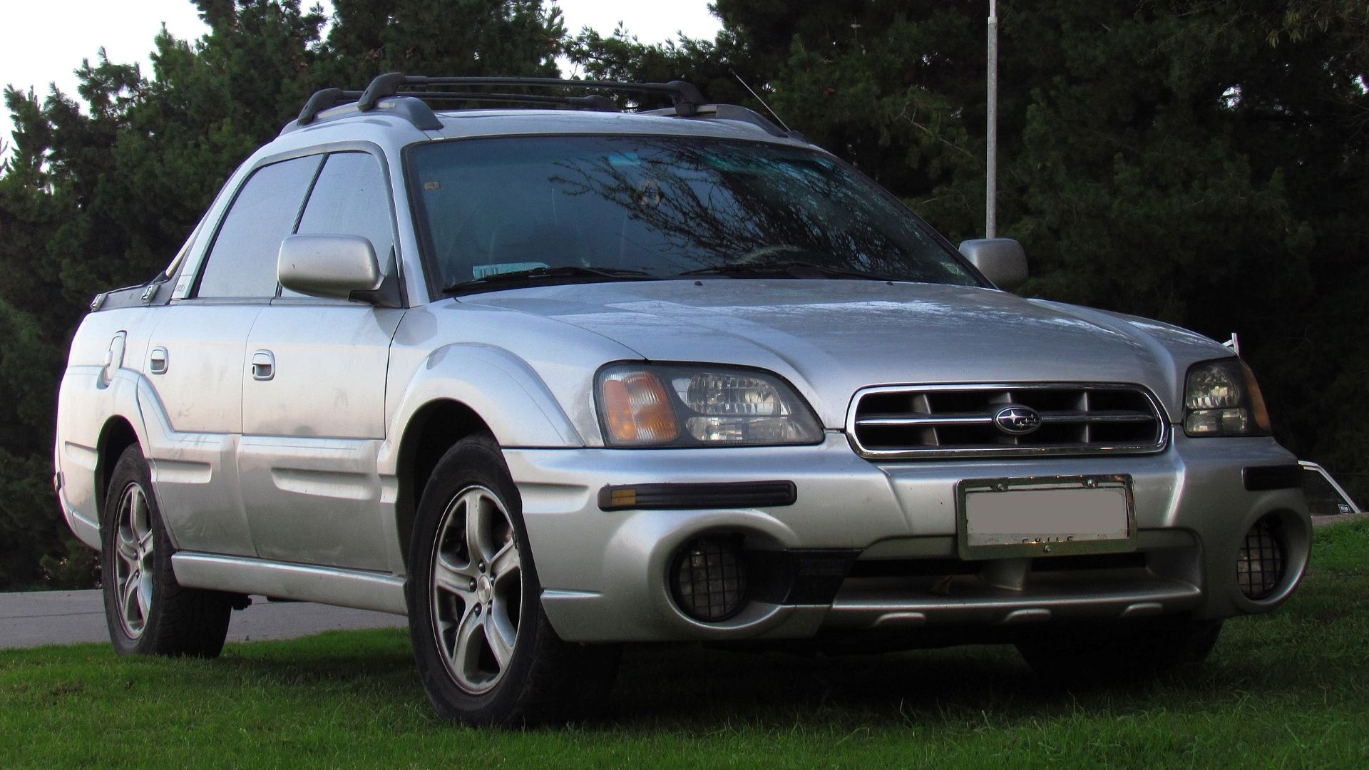 Front 3/4 shot of a silver 2003 Subaru Baja