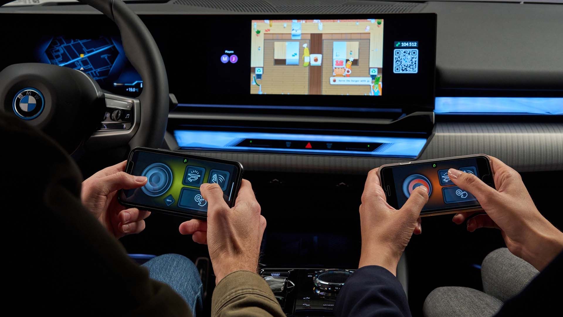 BMW i5 interior dashboard showing AirConsole in-car gaming