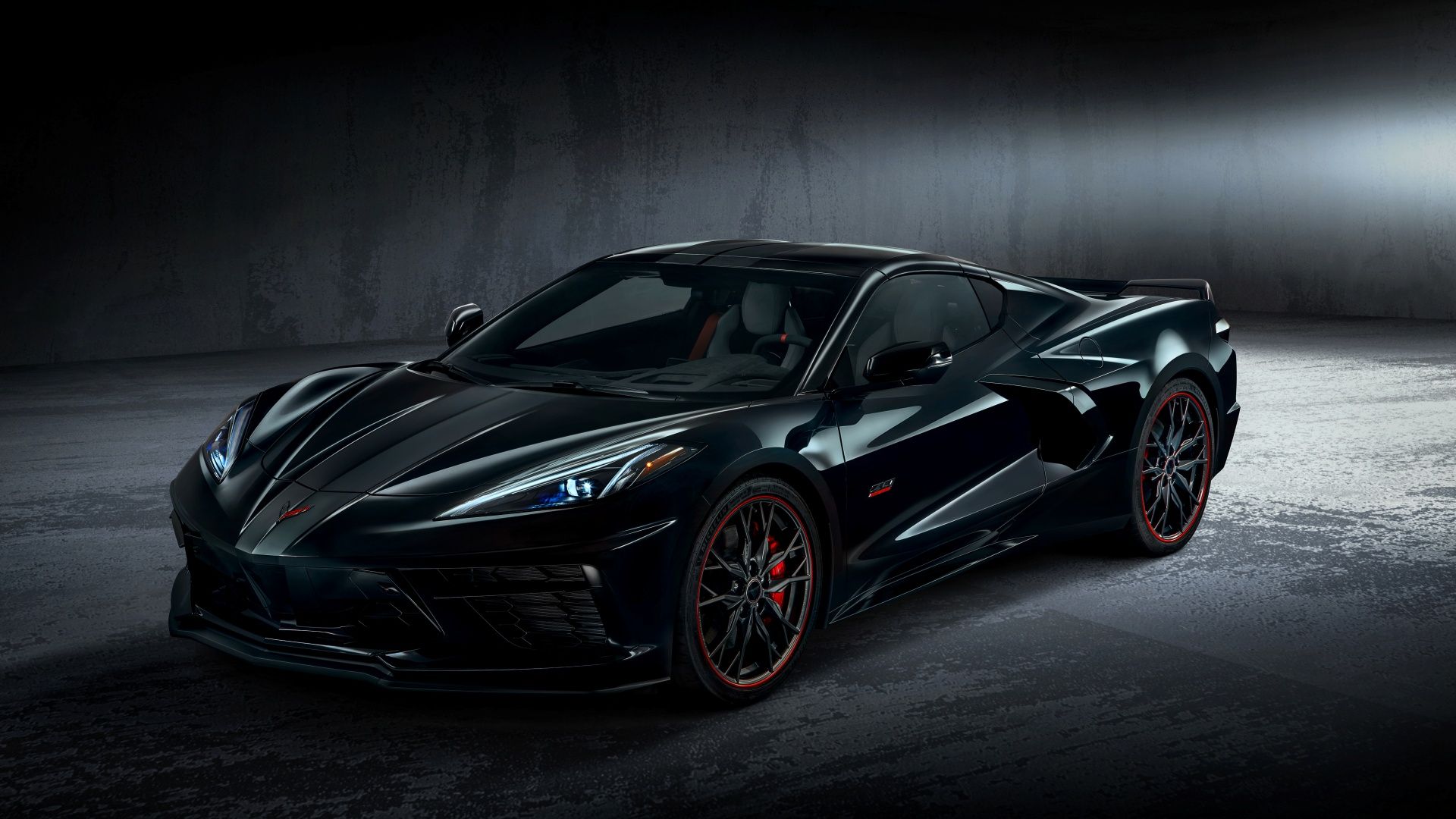 A front 3/4 studio shot of a 2023 Chevrolet Corvette Stingray 70th Anniversary coupe