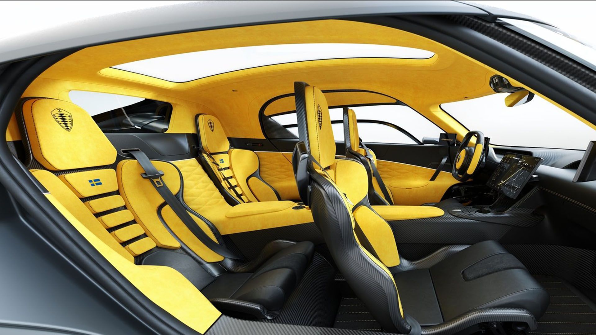Koenigsegg Gemera interior in yellow and black, shown through passenger-side door
