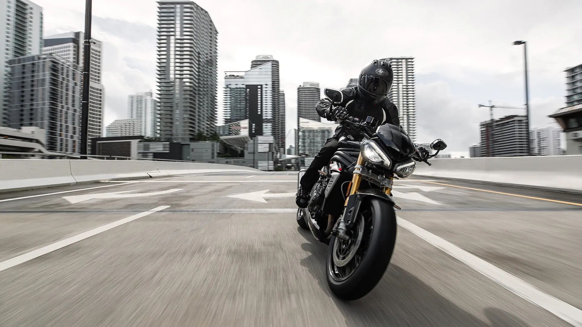 A front action shot of a Triumph Speed Triple 1200 RS
