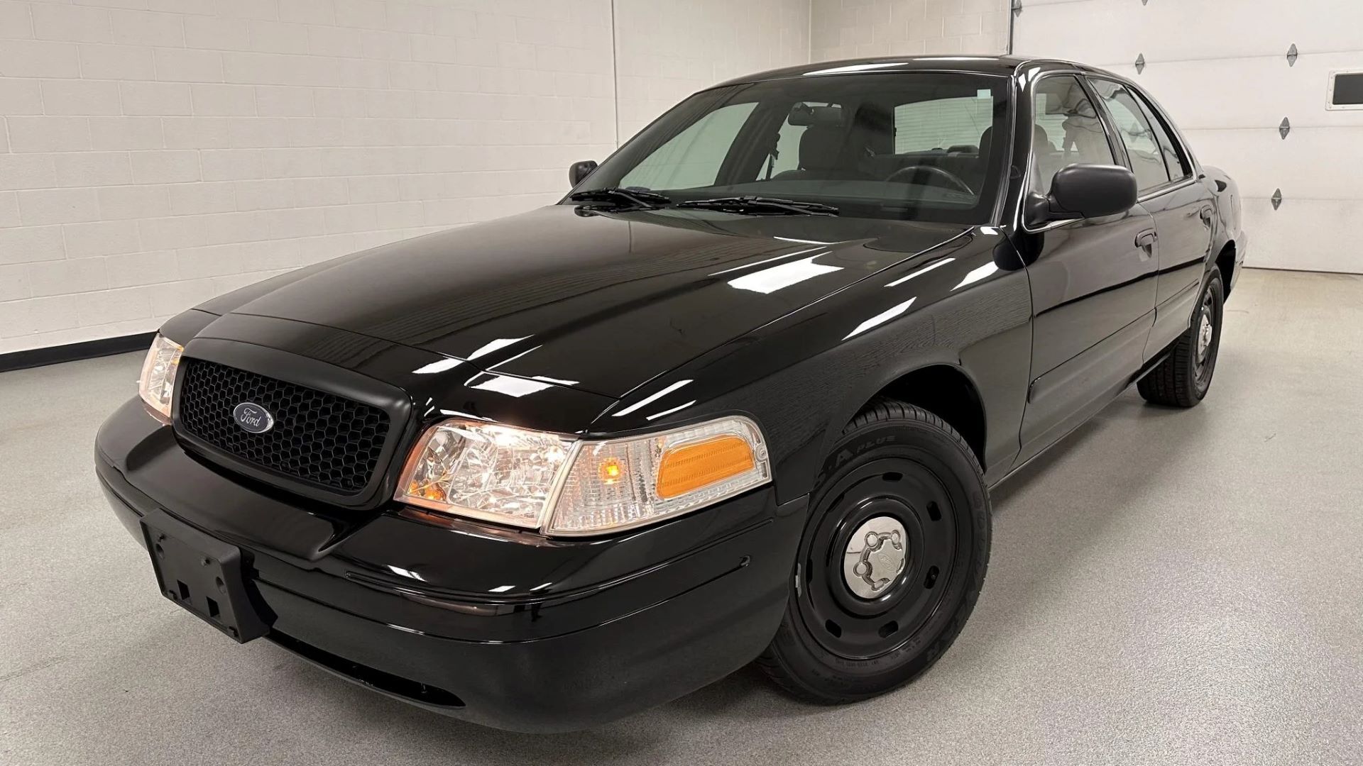 Front 3/4 shot of a 2003 Ford Crown victoria Police Interceptor parked