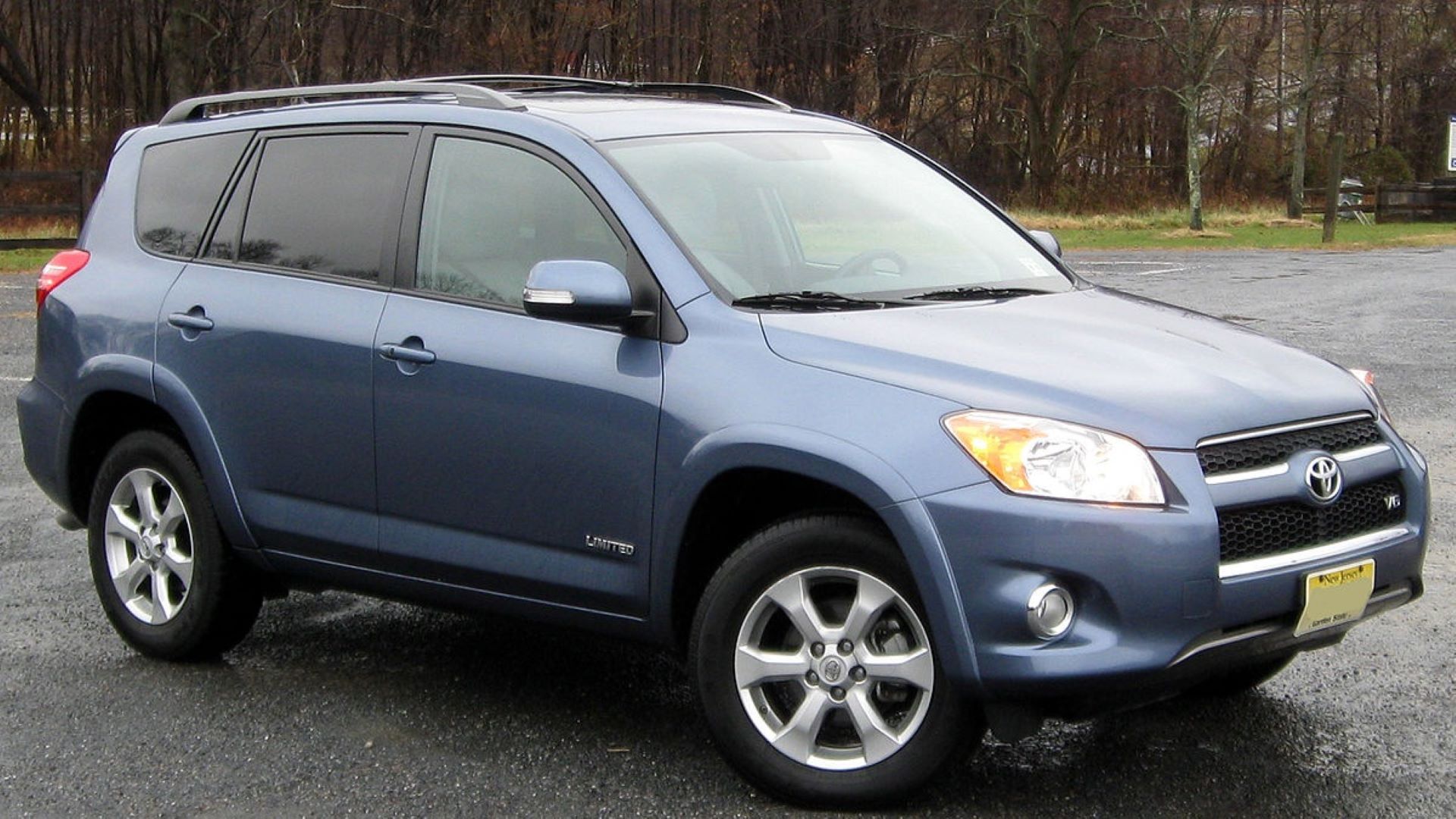 Front 3/4 shot of a 2010 Toyota RAV4 Limited parked