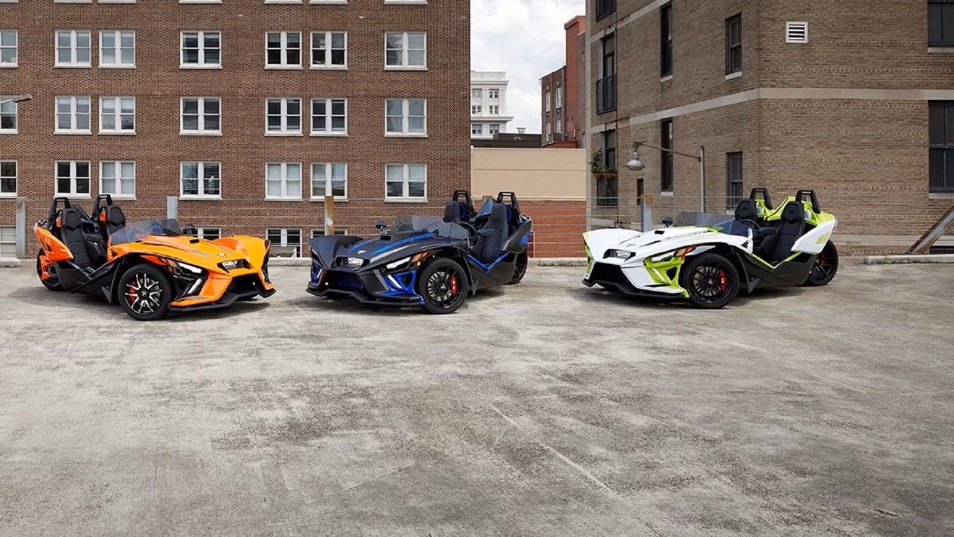 A group of parked 2023 Polaris Slingshot R
