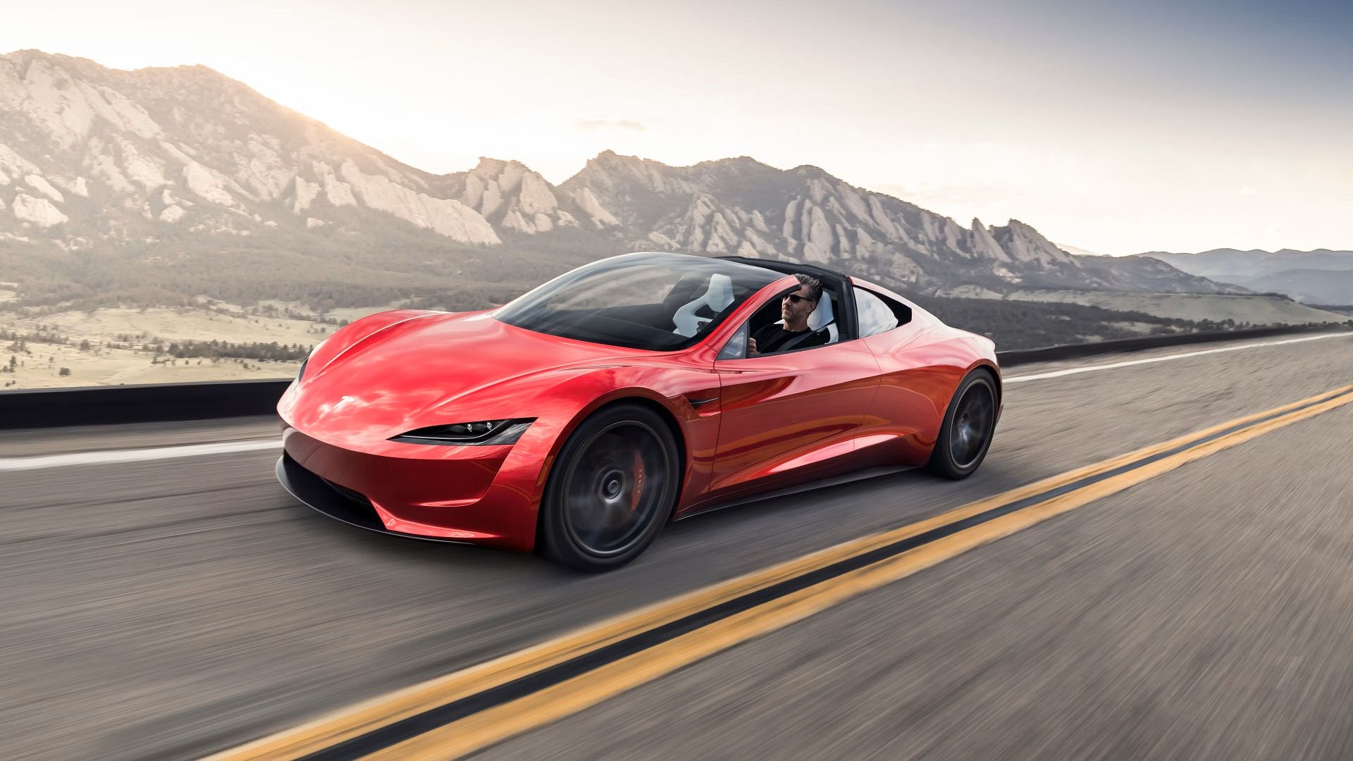 A driving 2023 Tesla Roadster