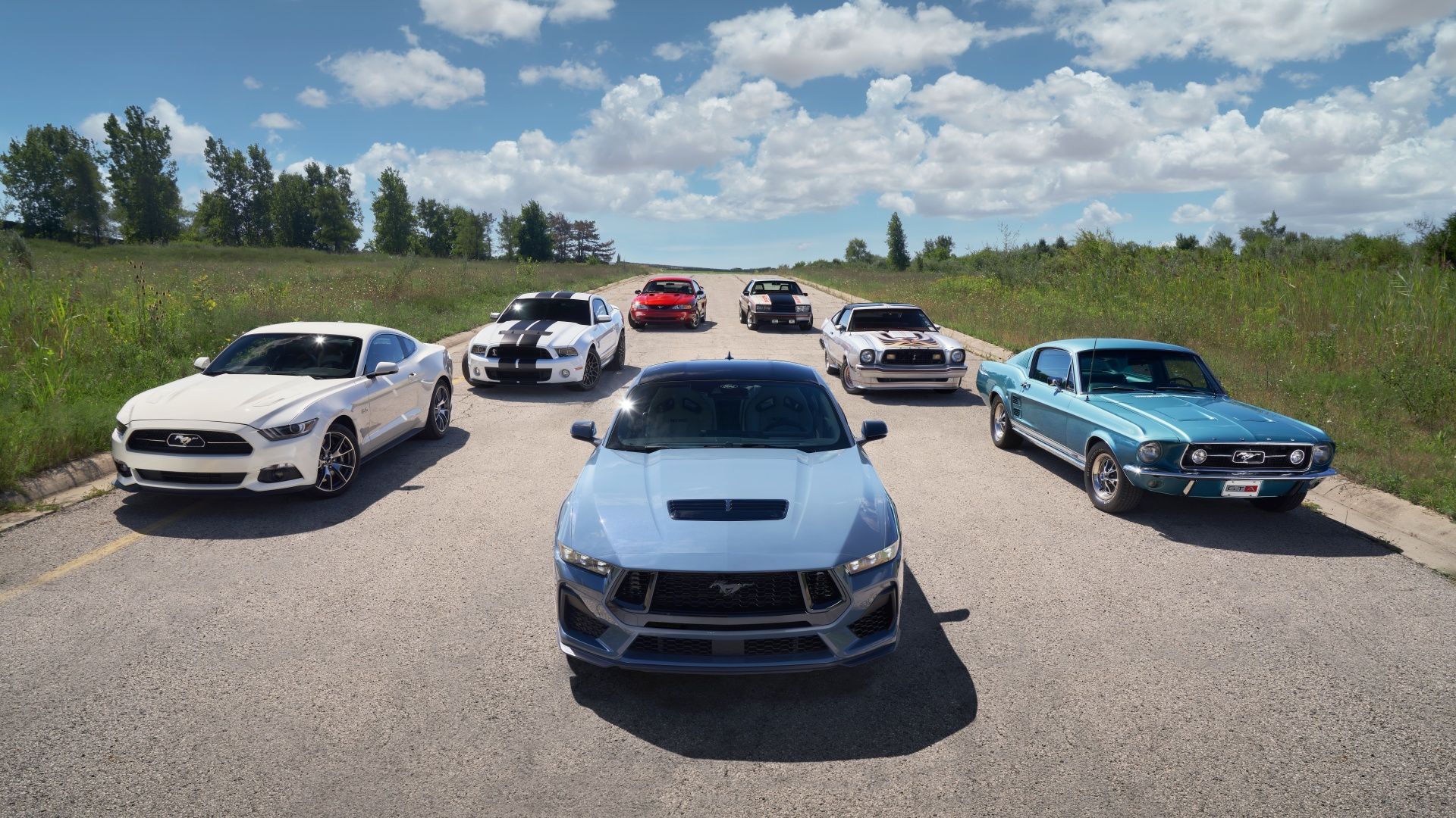A front shot of all the generations of the Ford Mustang