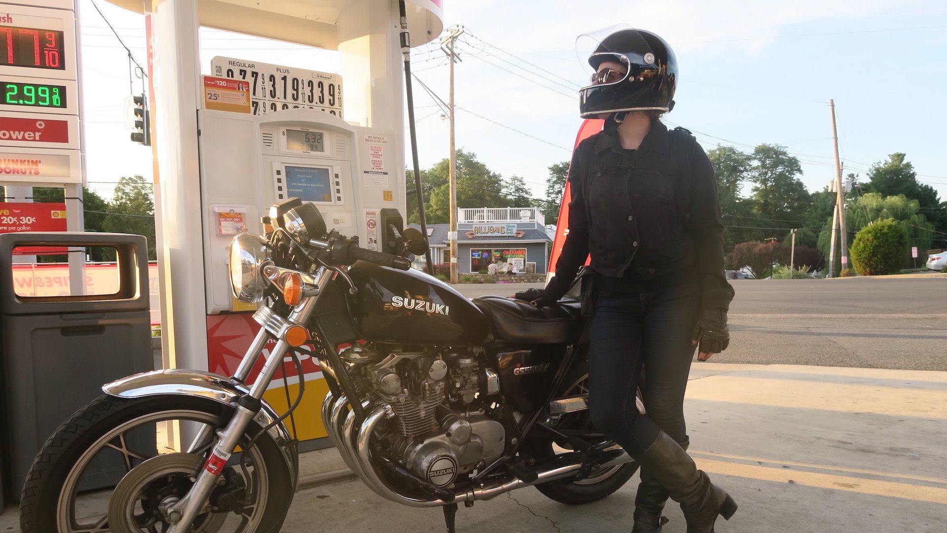 female motorcycle rider with helmet