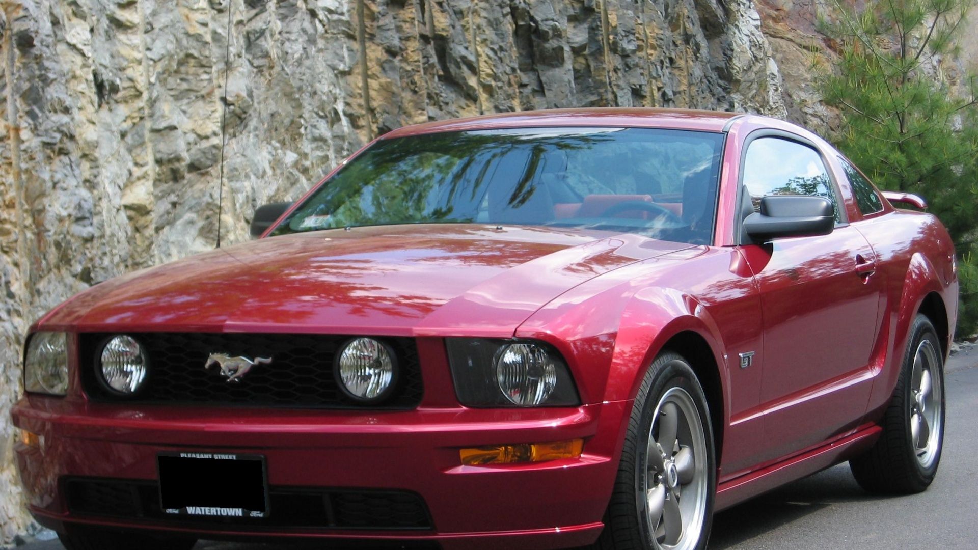 Red 2005 Ford Mustang GT W/T Bullit wheels