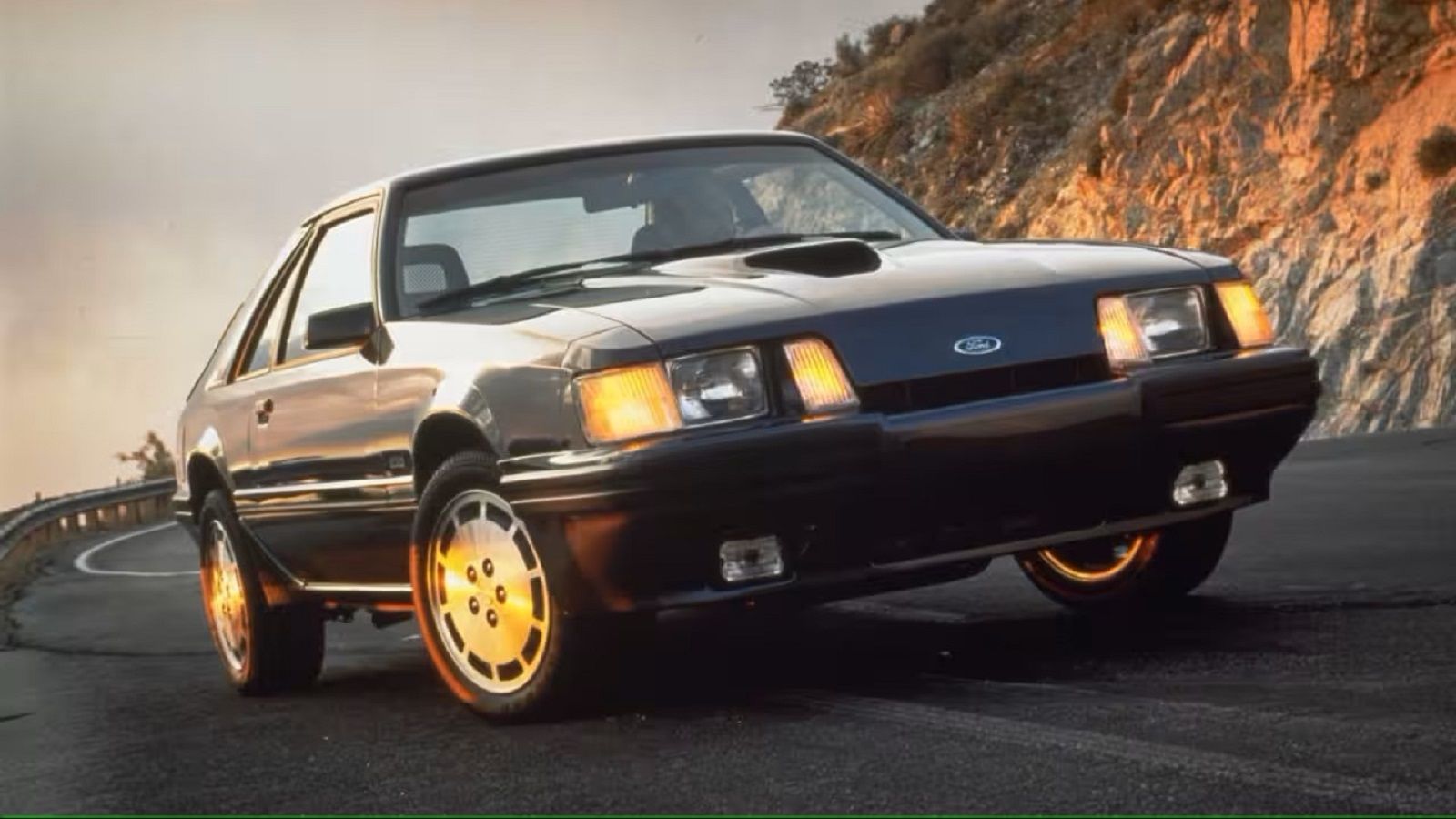 A parked 1984 Ford Mustang SVO