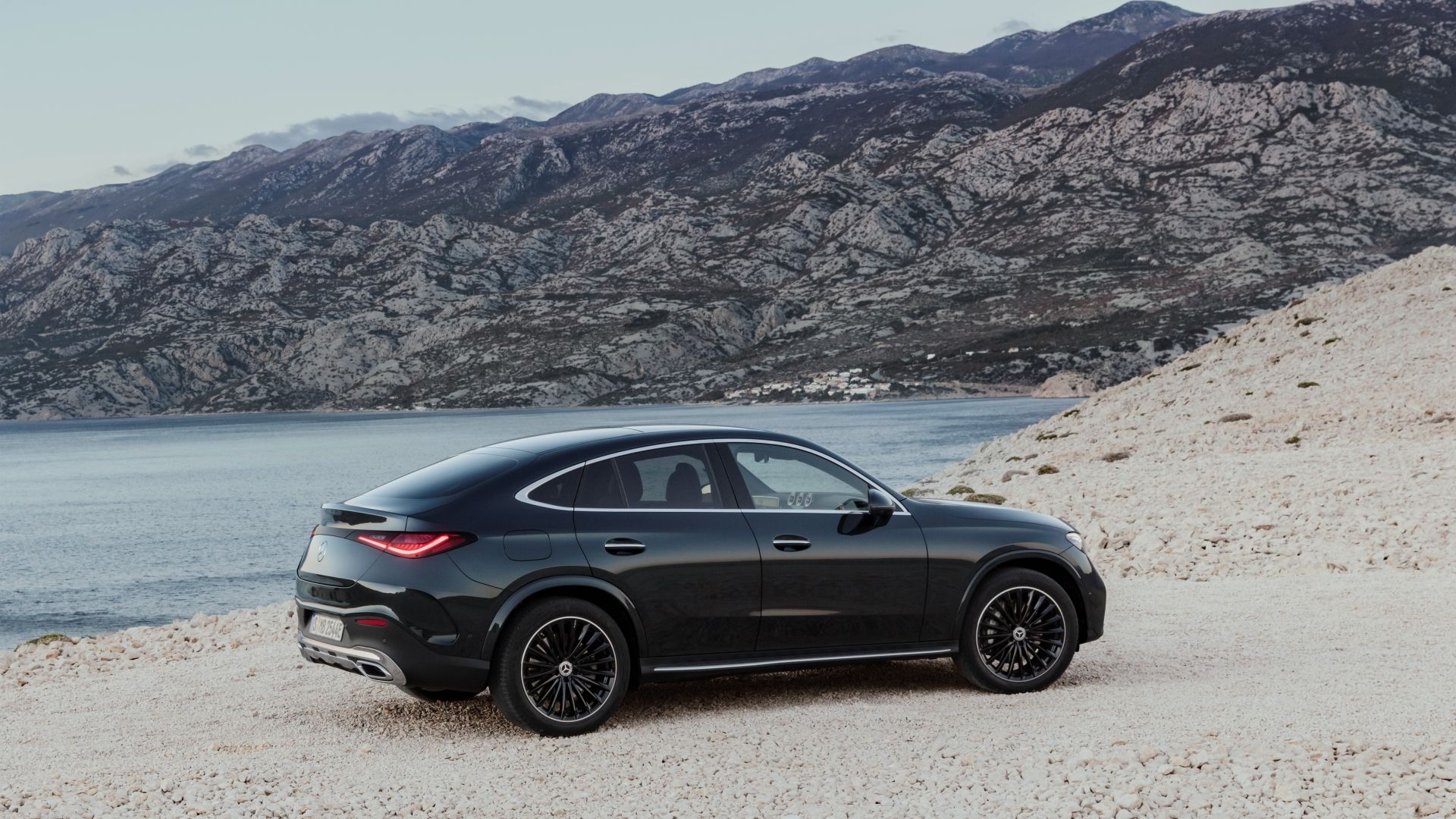 A side right outdoor shot of a 2023 Mercedes-Benz GLC Coupe