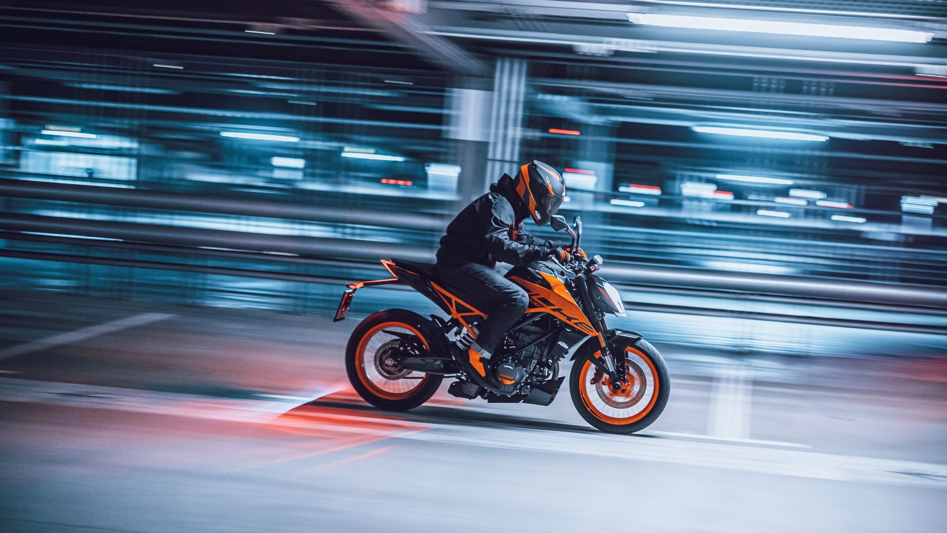 An side right action shot of the KTM 200 Duke