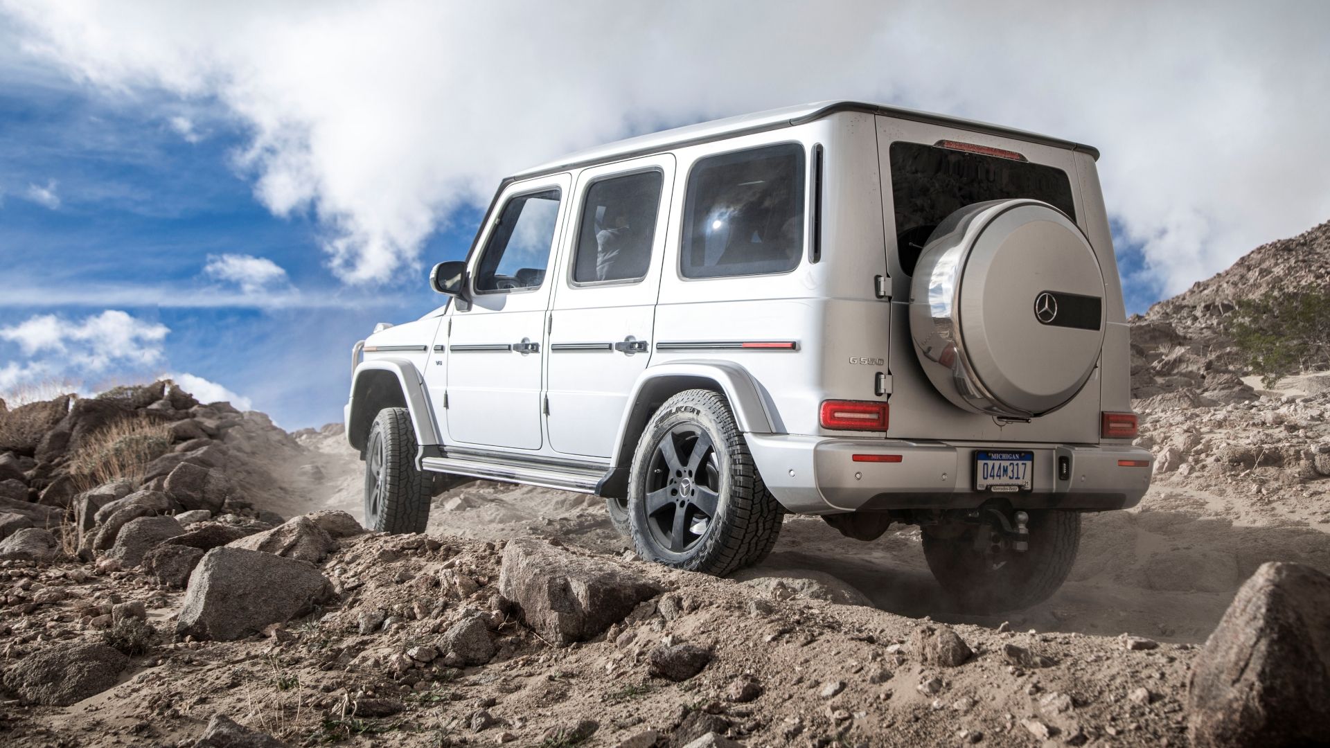 An action off-road shot of the Mercedes-Benz G 550 SUV