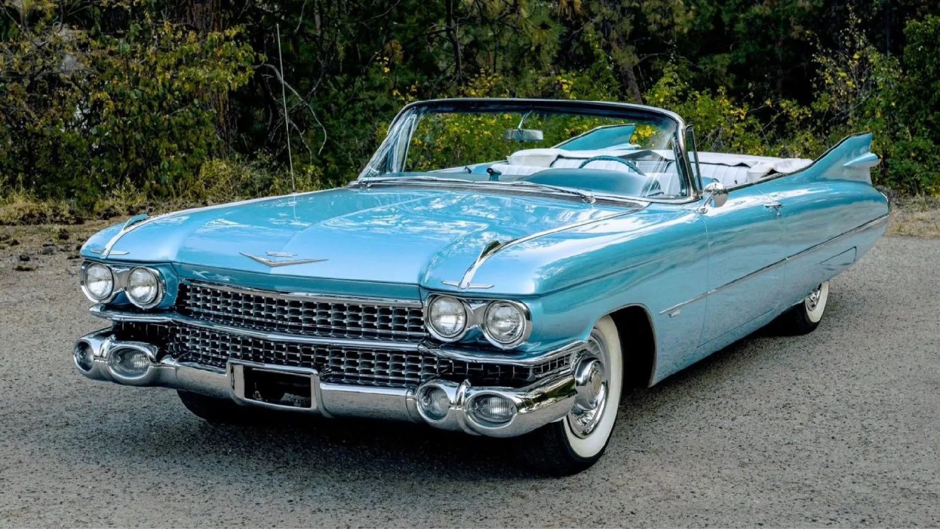 A blue 1959 Cadillac De Ville Convertible