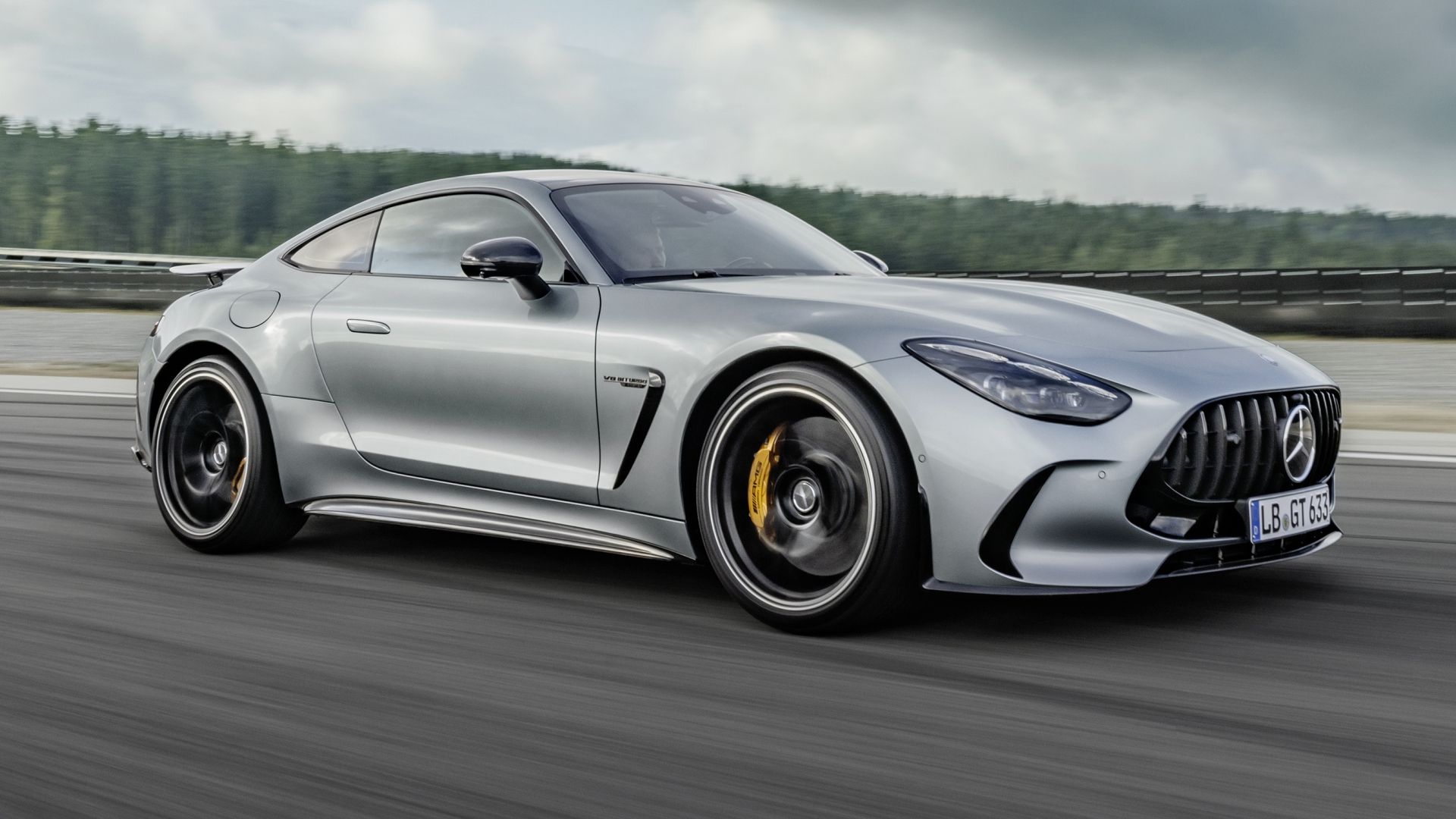 2024 Mercedes Benz AMG GT Coupe side front speeding angle