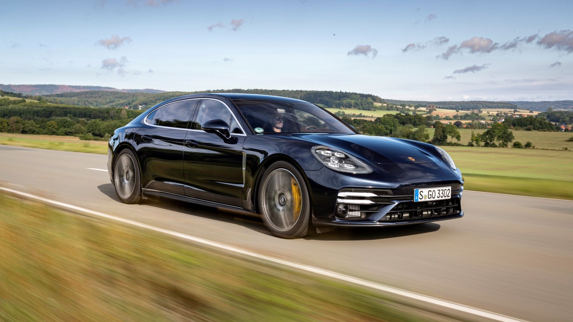 3/4 action shot of the 2023 Porsche Panamera Turbo S Executive