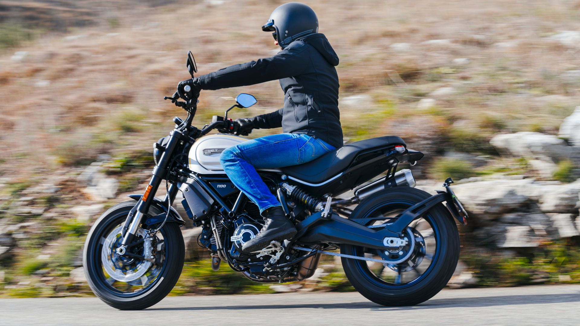 Ducati Scrambler 1100 Pro cruising on the road