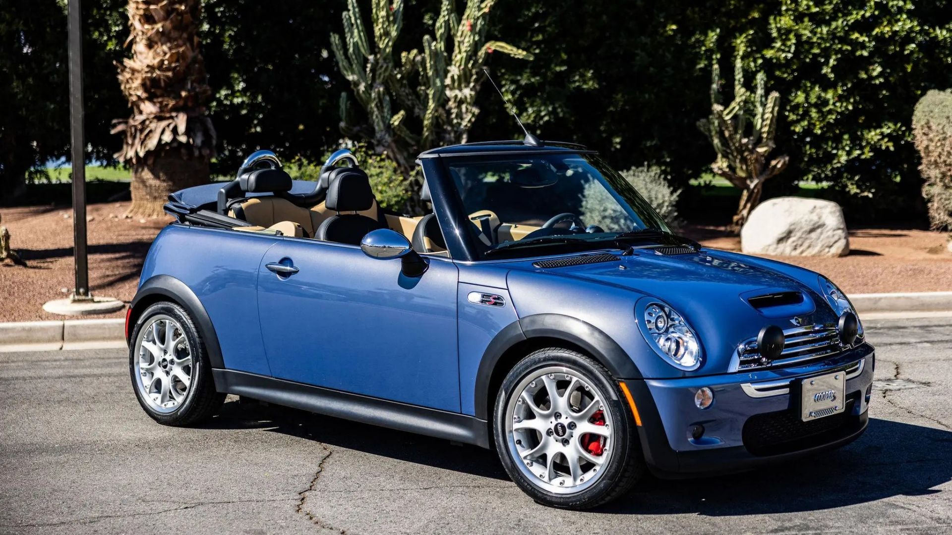 Light blue Mini Cooper S Convertible JCW