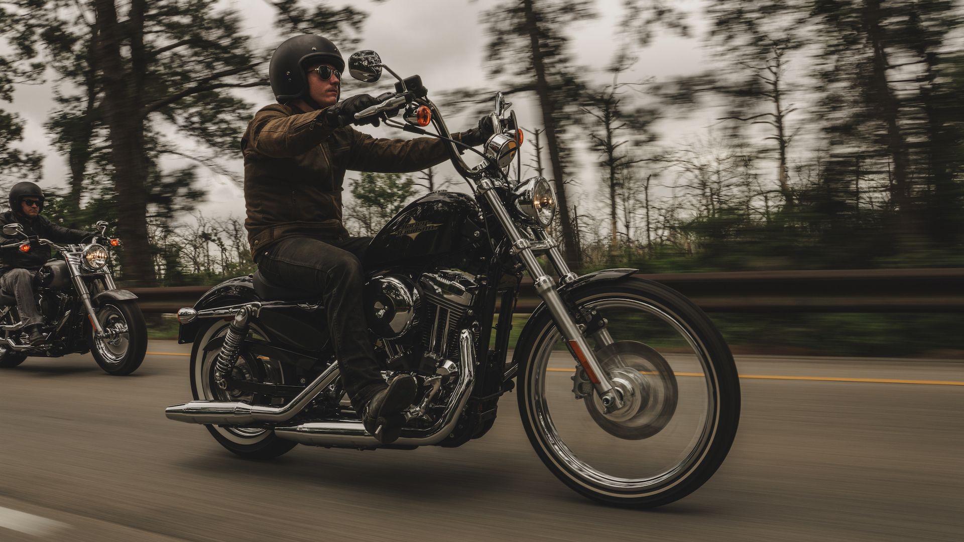 A 2016 Harley-Davidson Sportster Seventy-Two riding on the road.