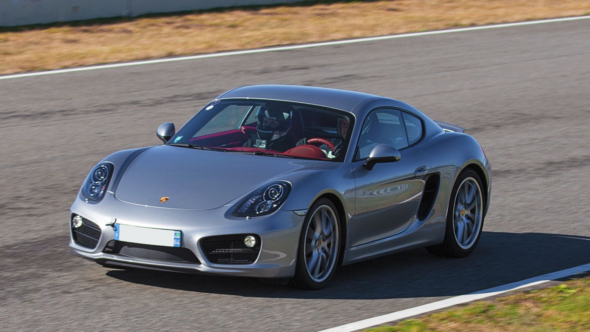 Porsche Cayman S on the race track