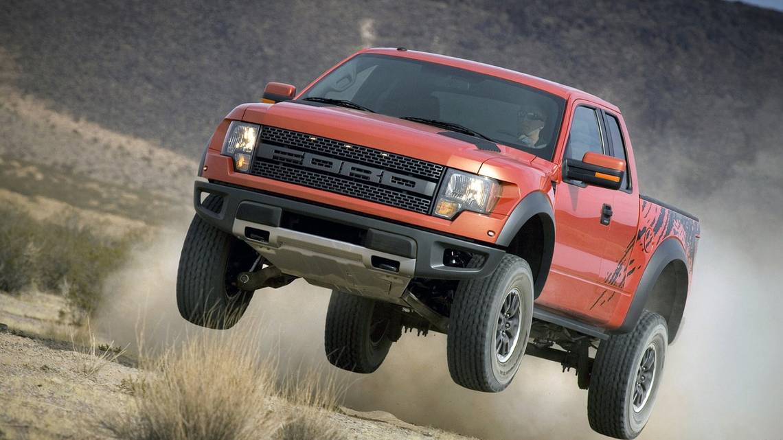 Front 3/4 shot of the 2010 Ford SVT F-150 Raptor R flying through the air