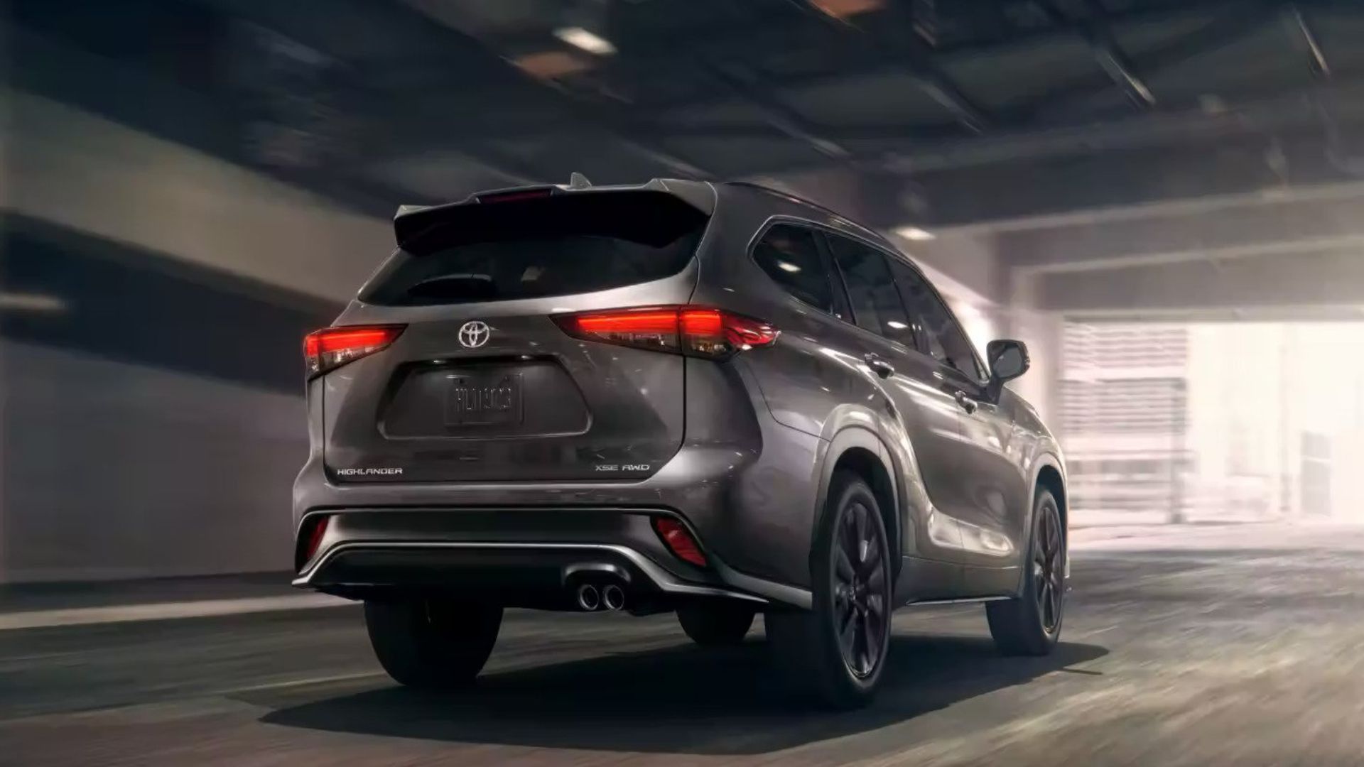 2023 Toyota Highlander Hybrid driving in a tunnel