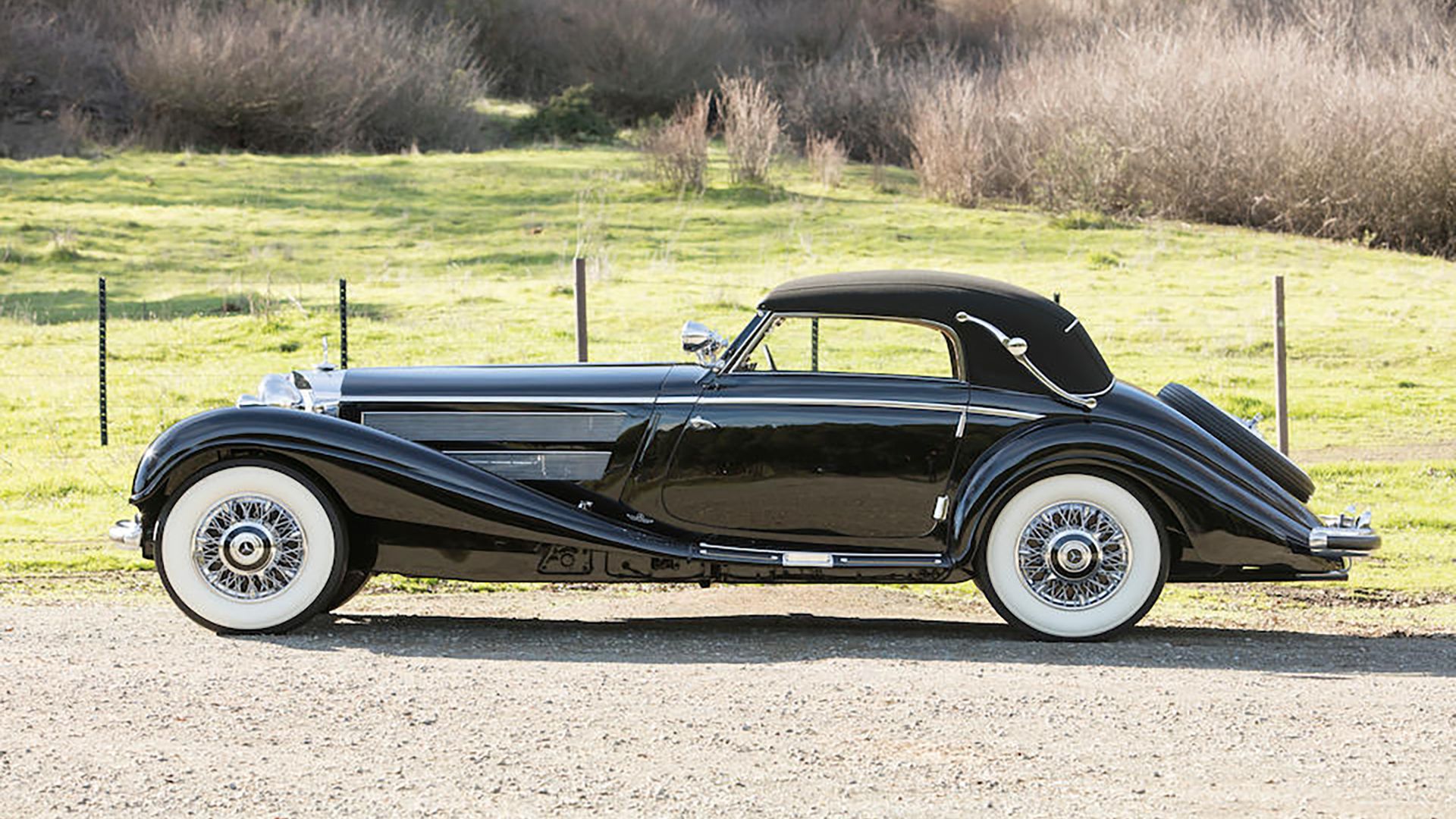 A black 1937 Mercedes-Benz 540K