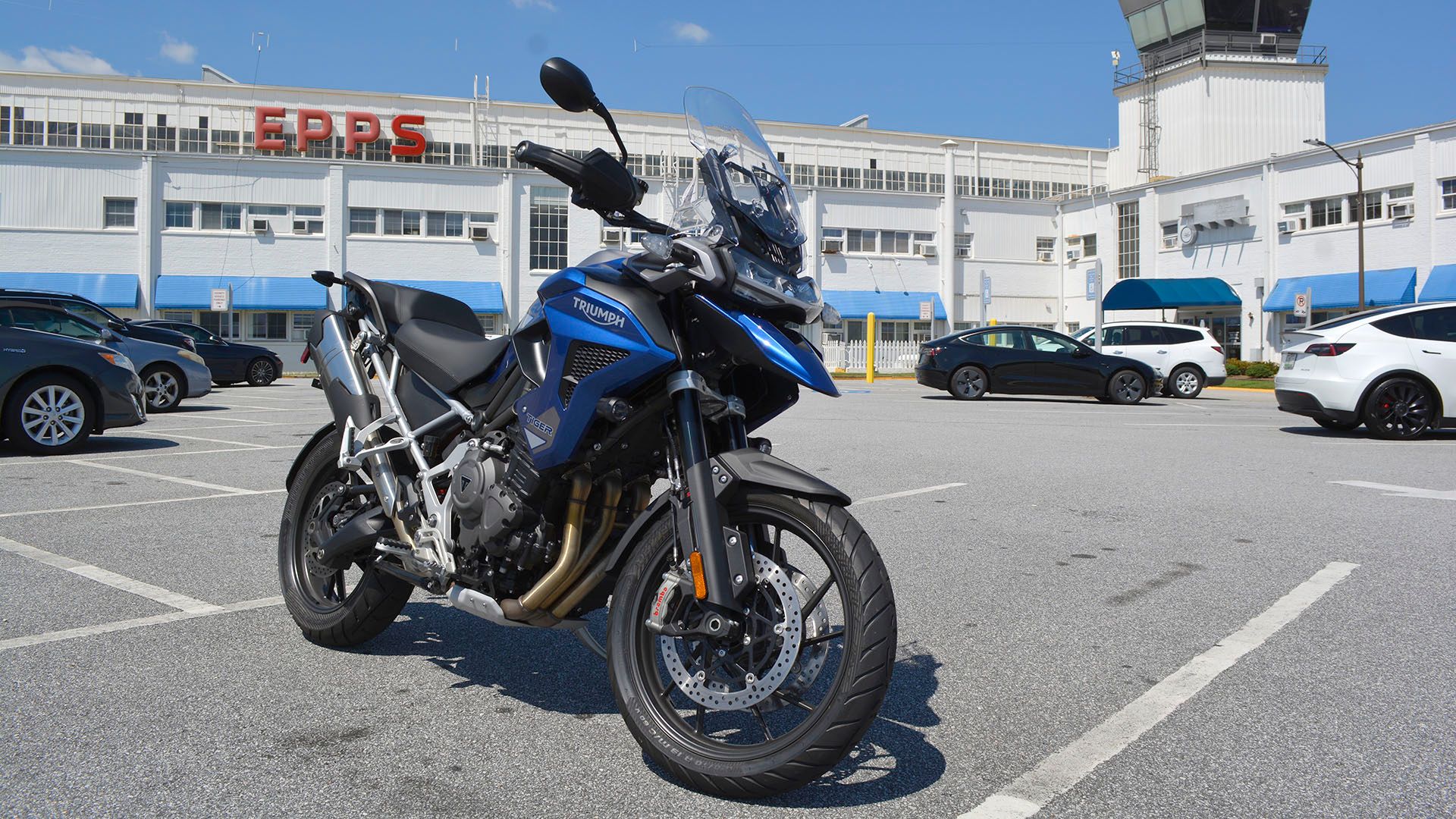 2023 Triumph Tiger 1200 GT Pro parked at airport.