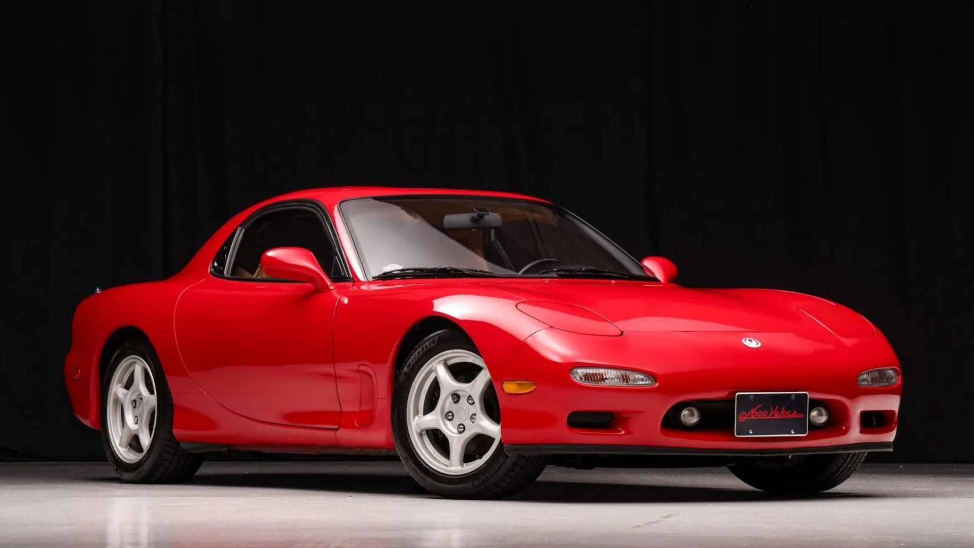 A red showroom condition Mazda RX-7 FD