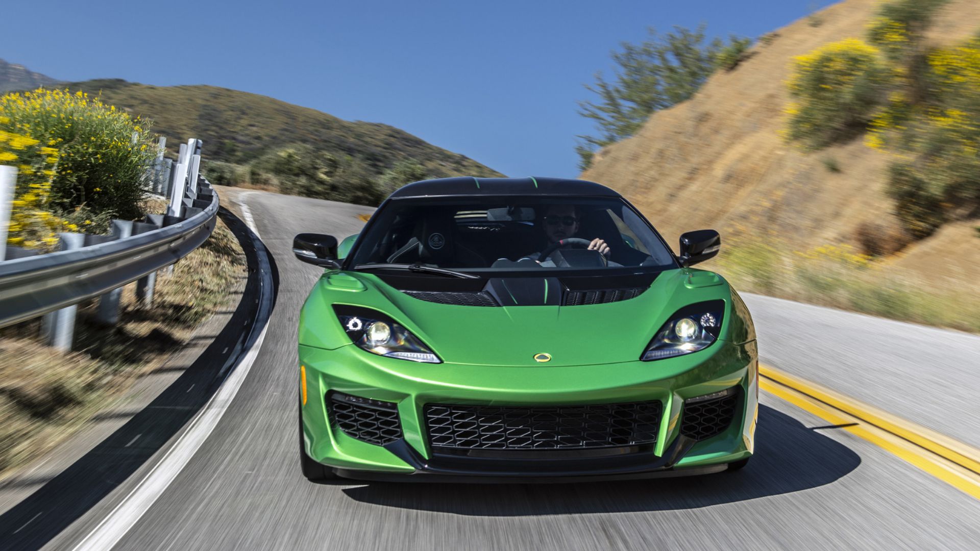 2020 Lotus Evora GT in green posing on mountain road