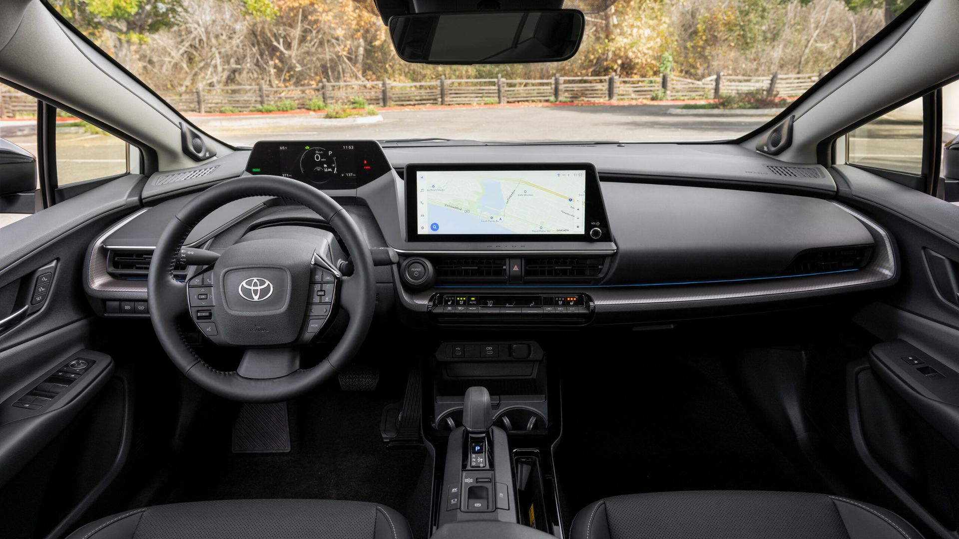 Interior view of a Toyota Prius featuring a large touchscreen display.