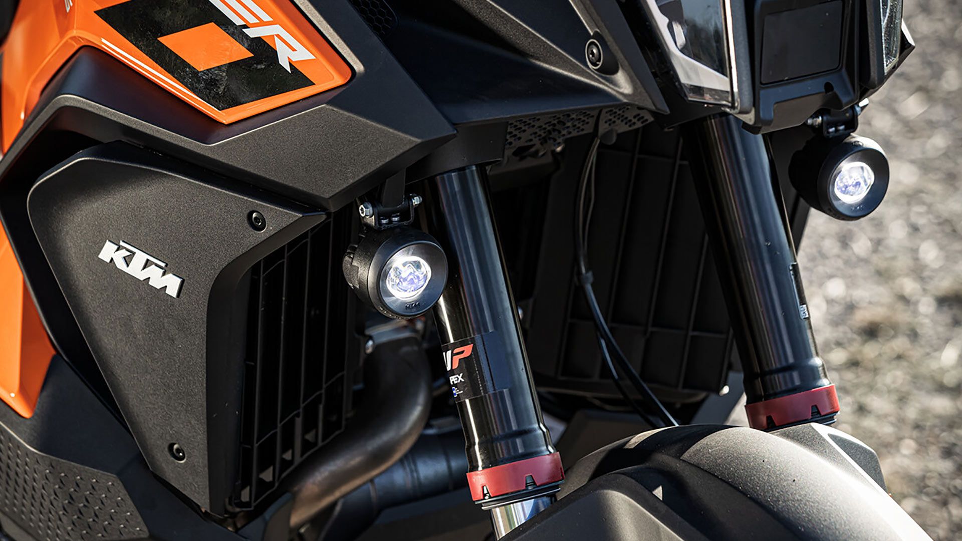 Closeup detailed photograph of 2023 KTM 1290 SUPER ADVENTURE S auxiliary lamp kit.