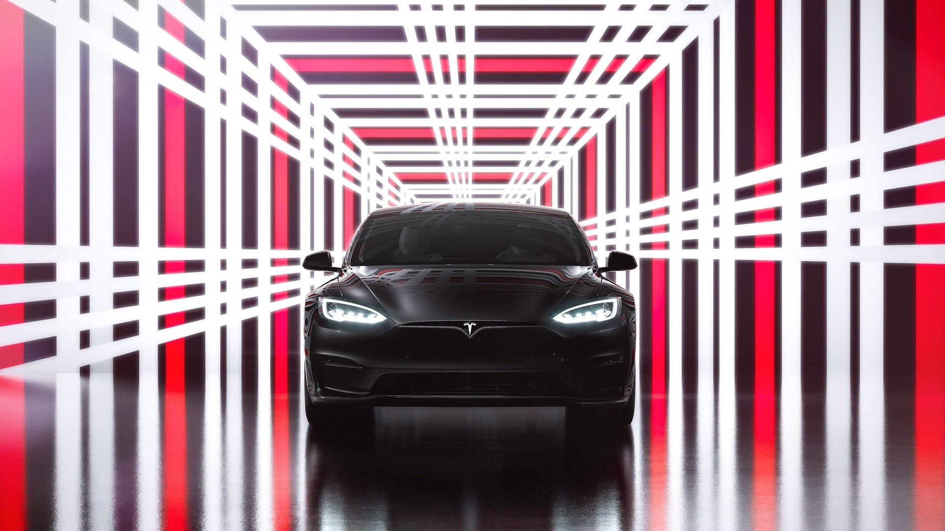 Tesla Model S in a lightroom.