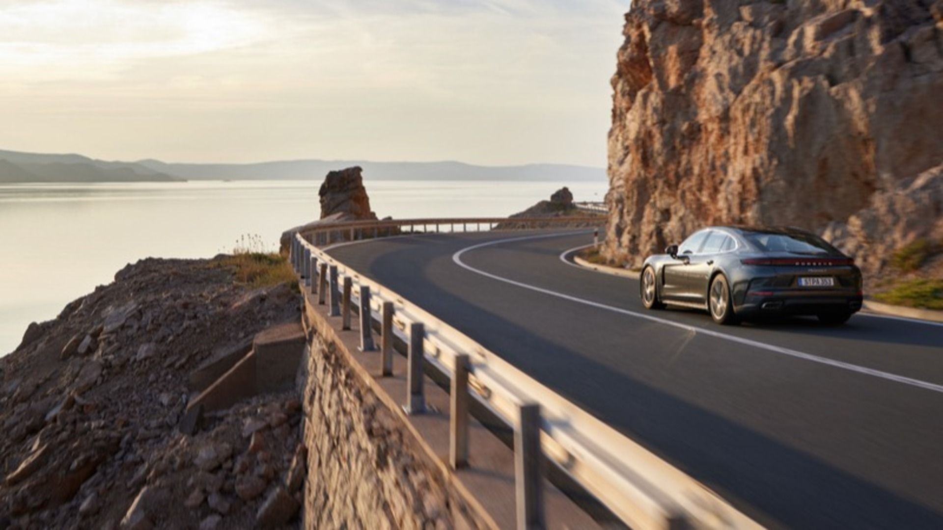 A 2024 Porsche Panamera E-Hybrid on the open road.