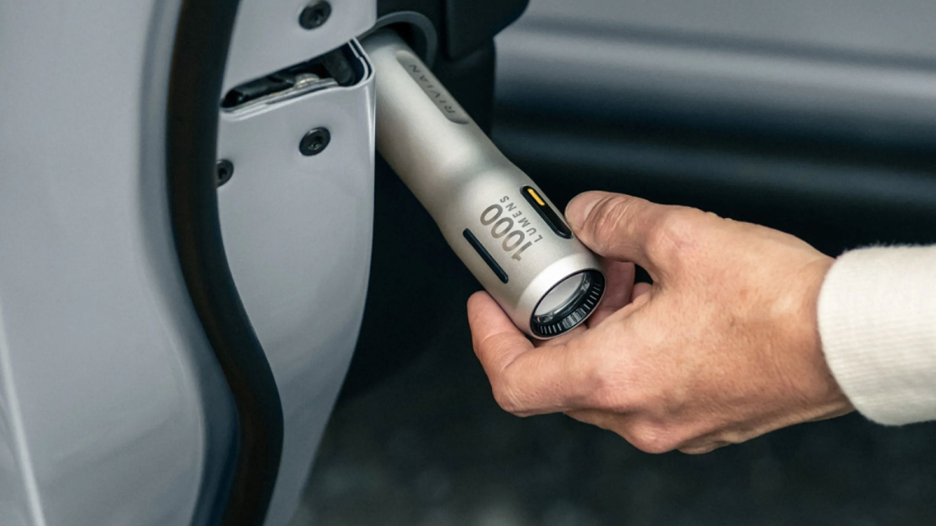 The flashlight onboard the Rivian R1T with its integrated door pocket