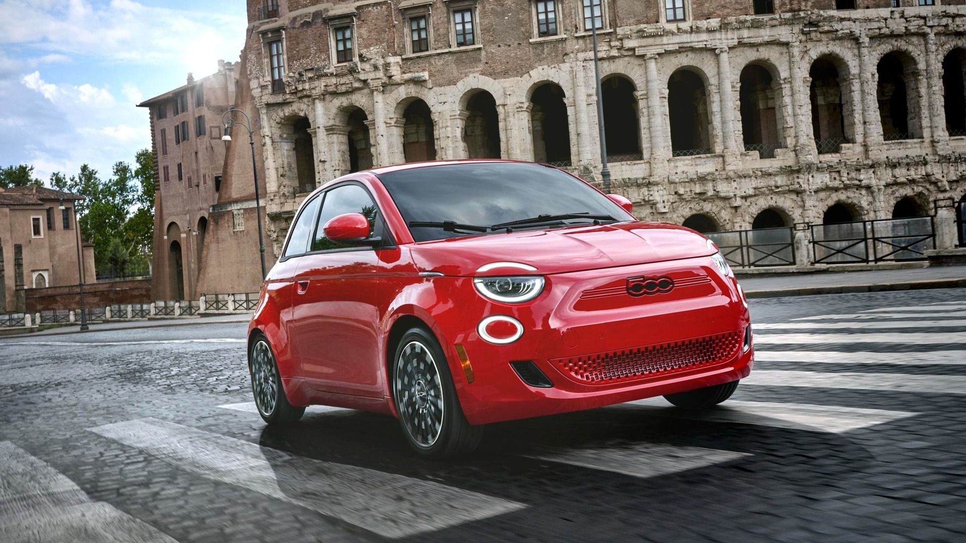 Red 2018 Fiat 500e on Roman roads 