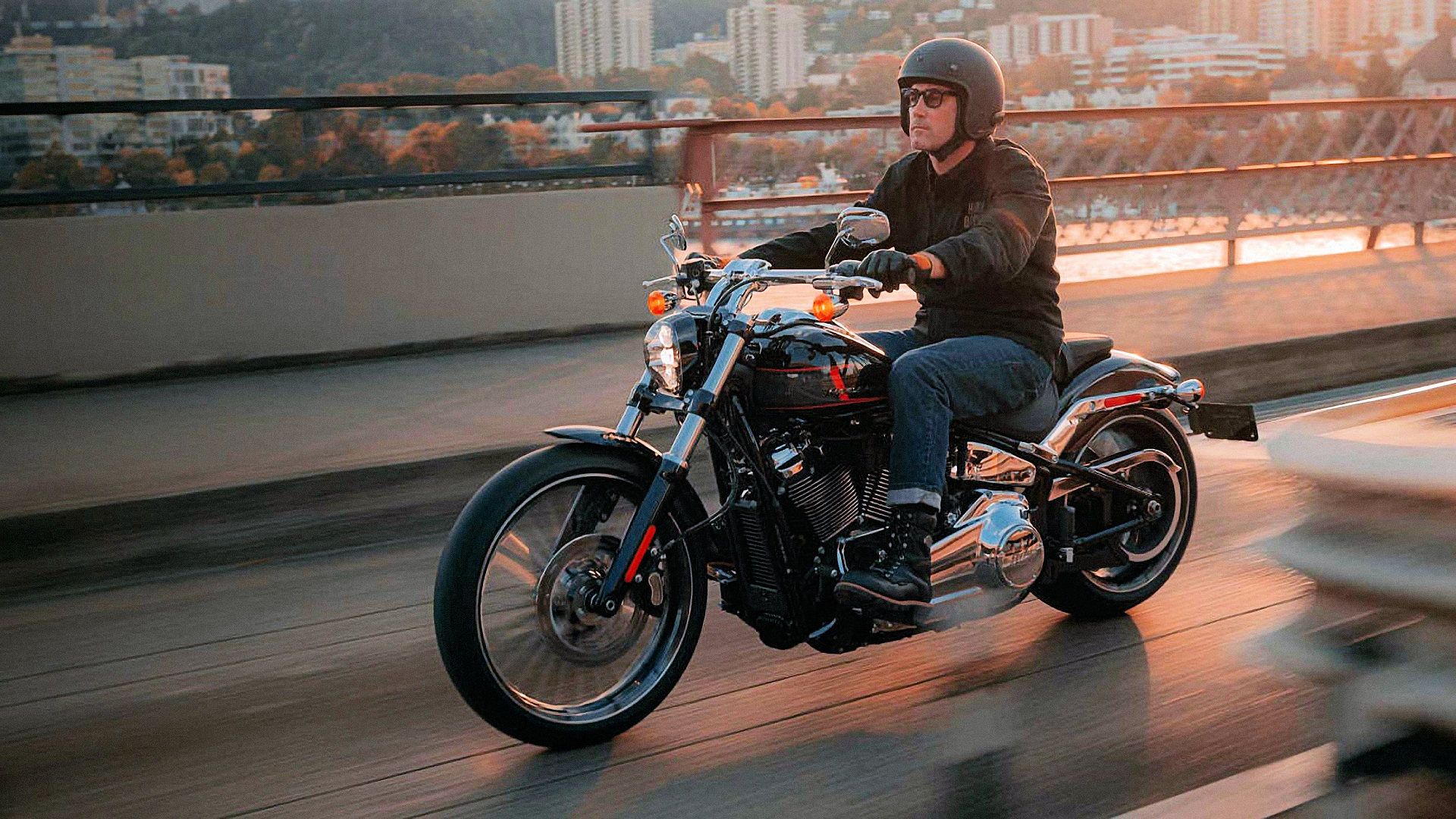 2024 Harley-Davidson Breakout 117 cruising over a bridge