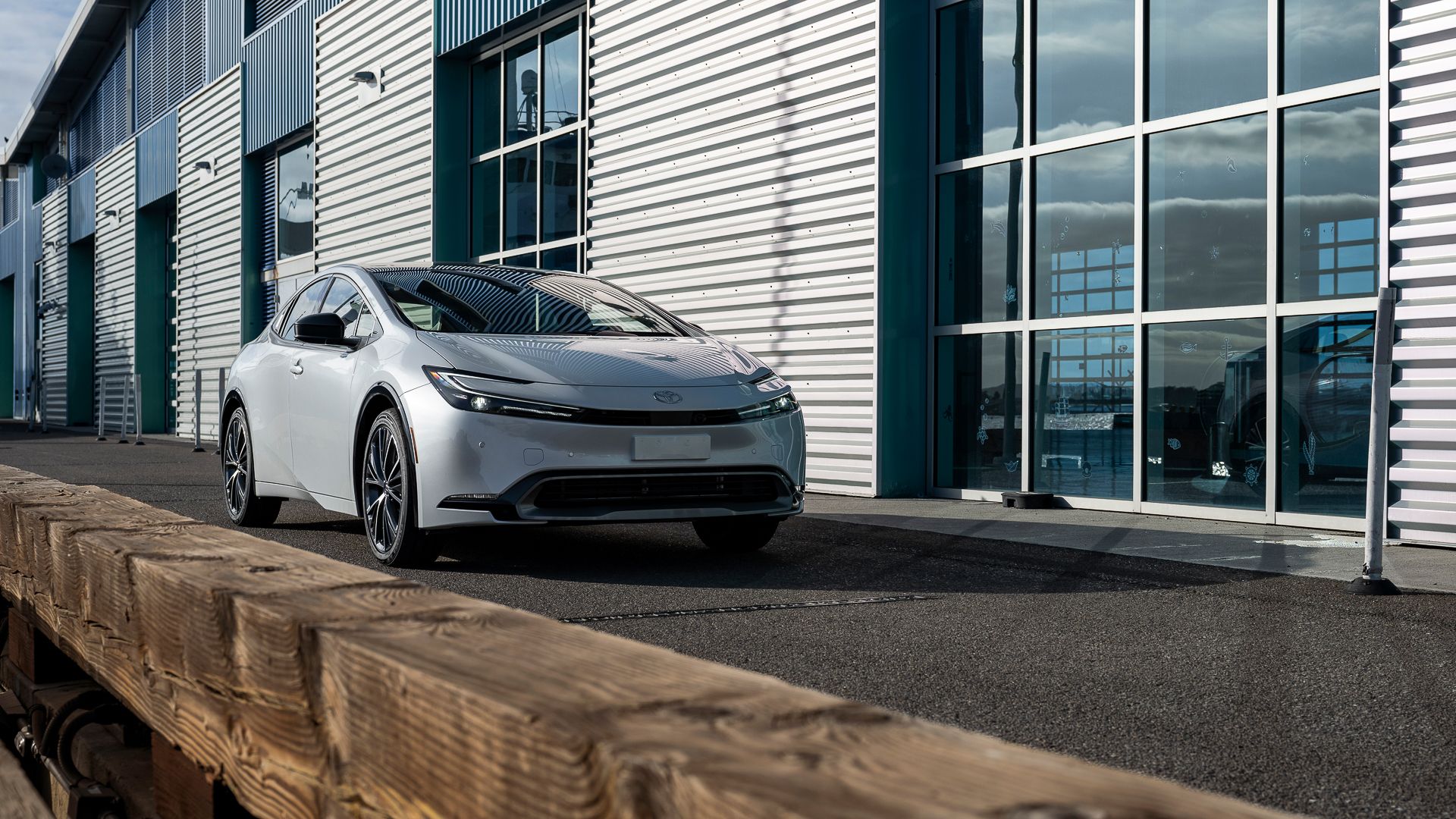 2024 Toyota Prius Parked Next to a building