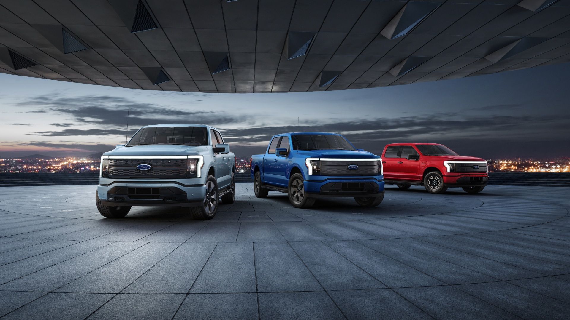 Image of a silver, a blue, and a red Ford F-150 Lightning