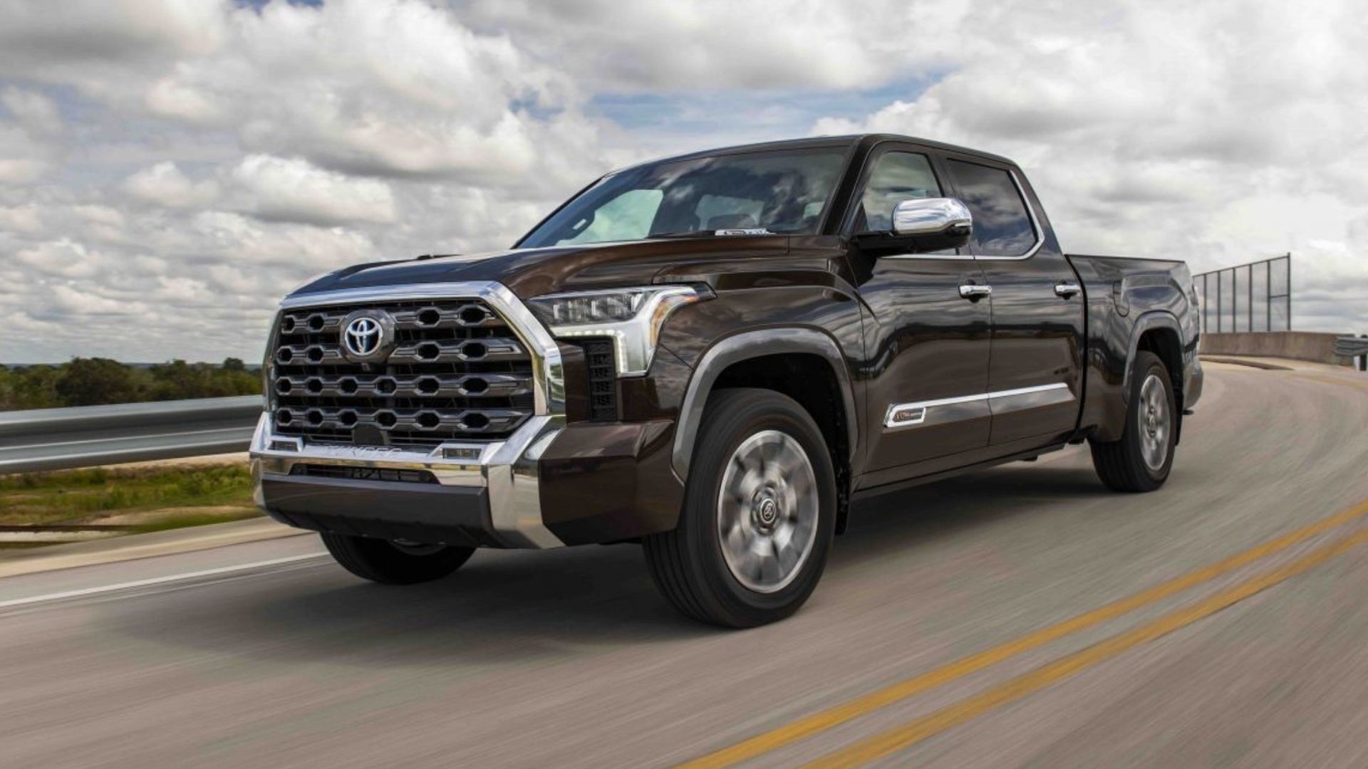 2024 Toyota Tundra 1794 Edition in smoked mesquite posing on freeway