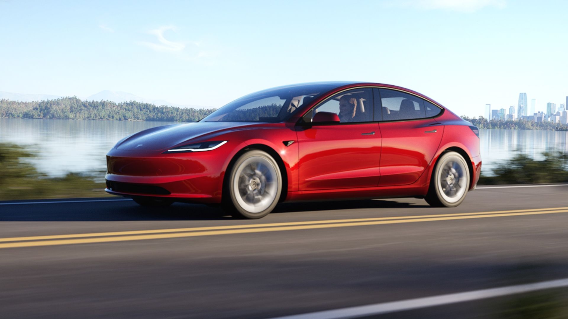 Red Tesla Model 3 front-quarter tracking
