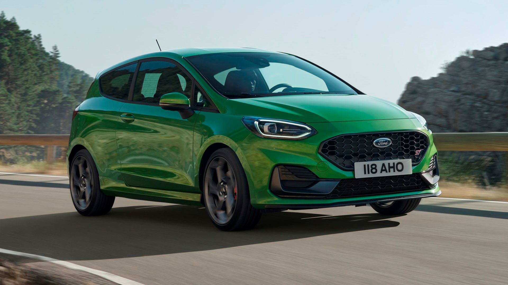 Green Ford Fiesta ST front-quarter tracking