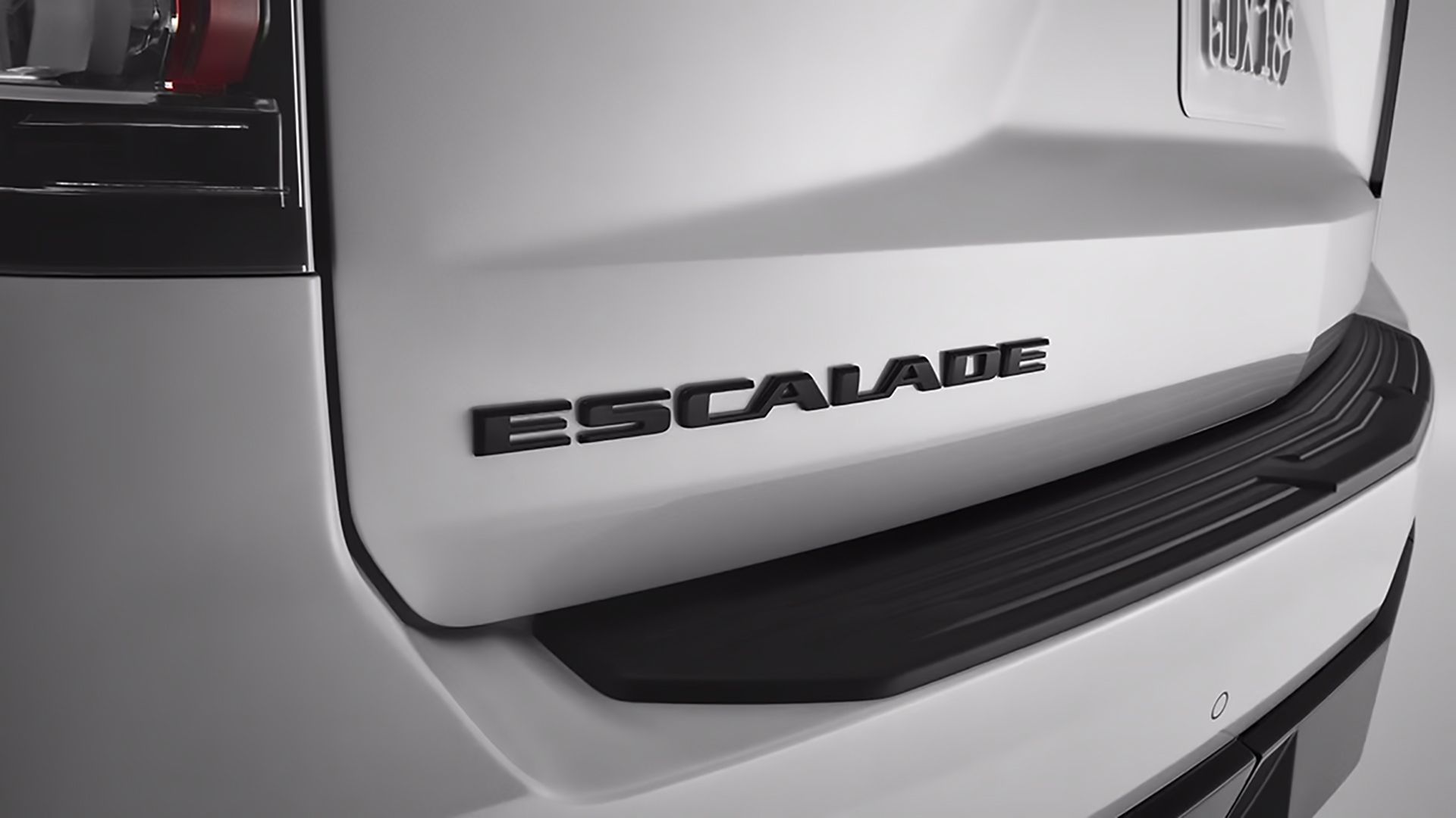 The 2024 Cadillac Escalade's rear nameplate with the Onyx Package