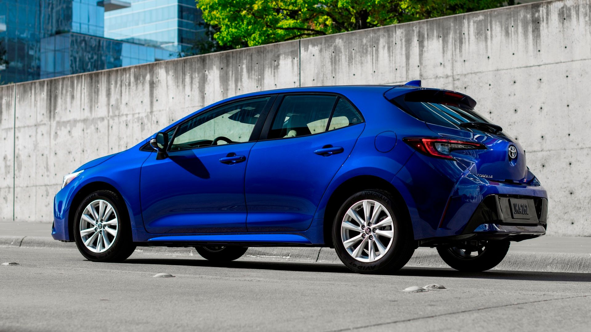 Blue Crush Metallic Corolla Hatchback SE rear-quarter 