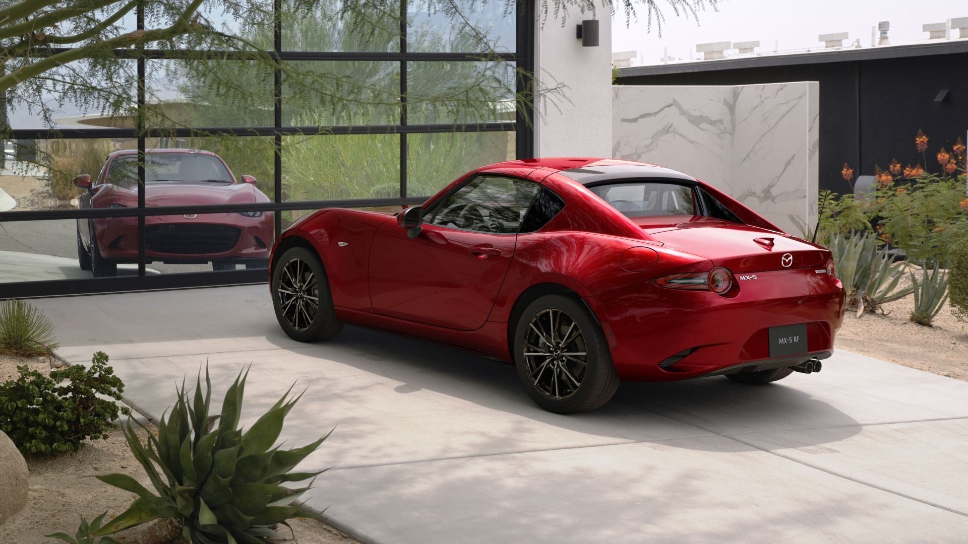 Red Mazda MX-5 Miata Retractable Fastback rear-quarter