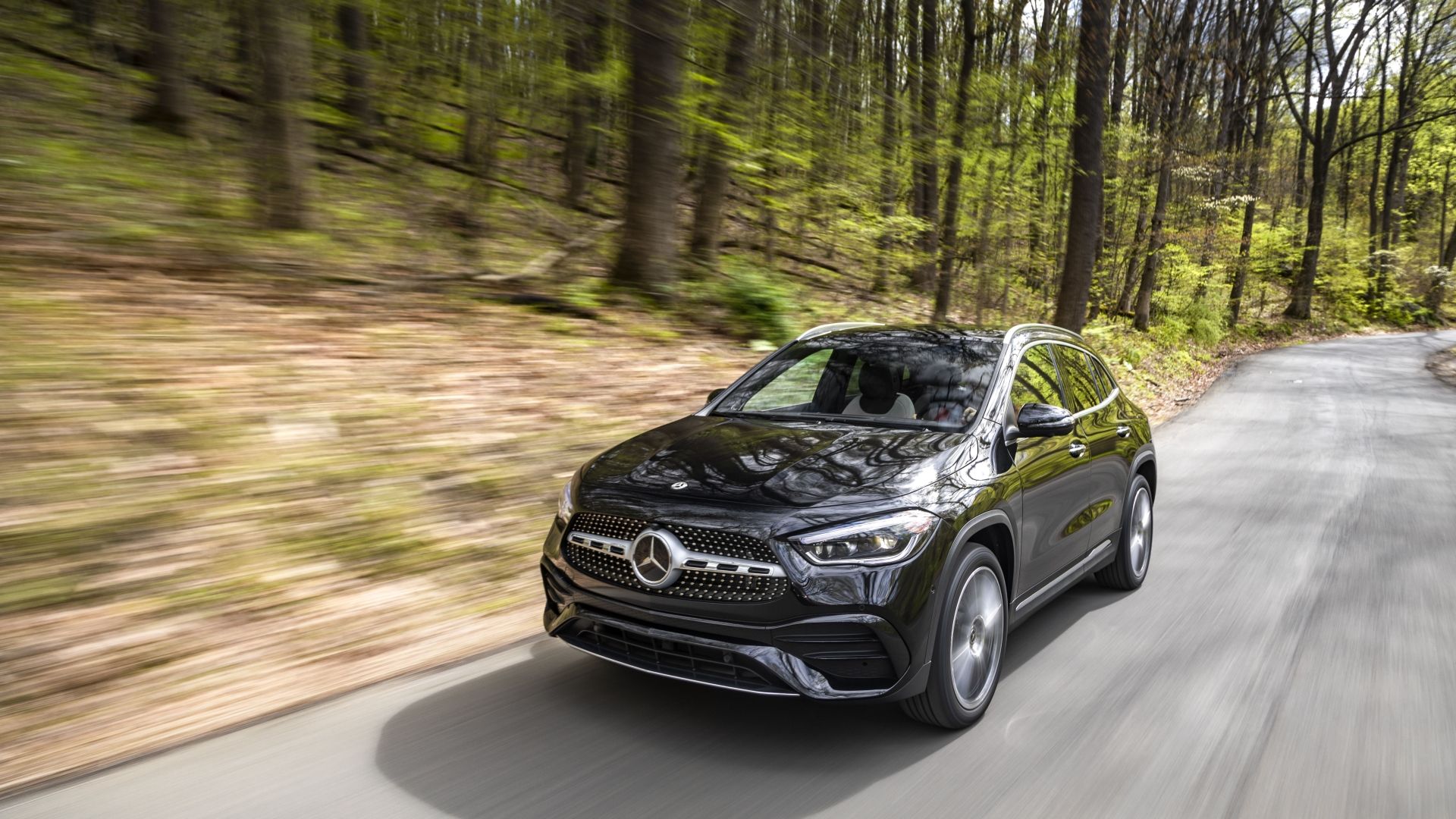 Front 3/4 action shot of a 2021 Mercedes-Benz GLA 250