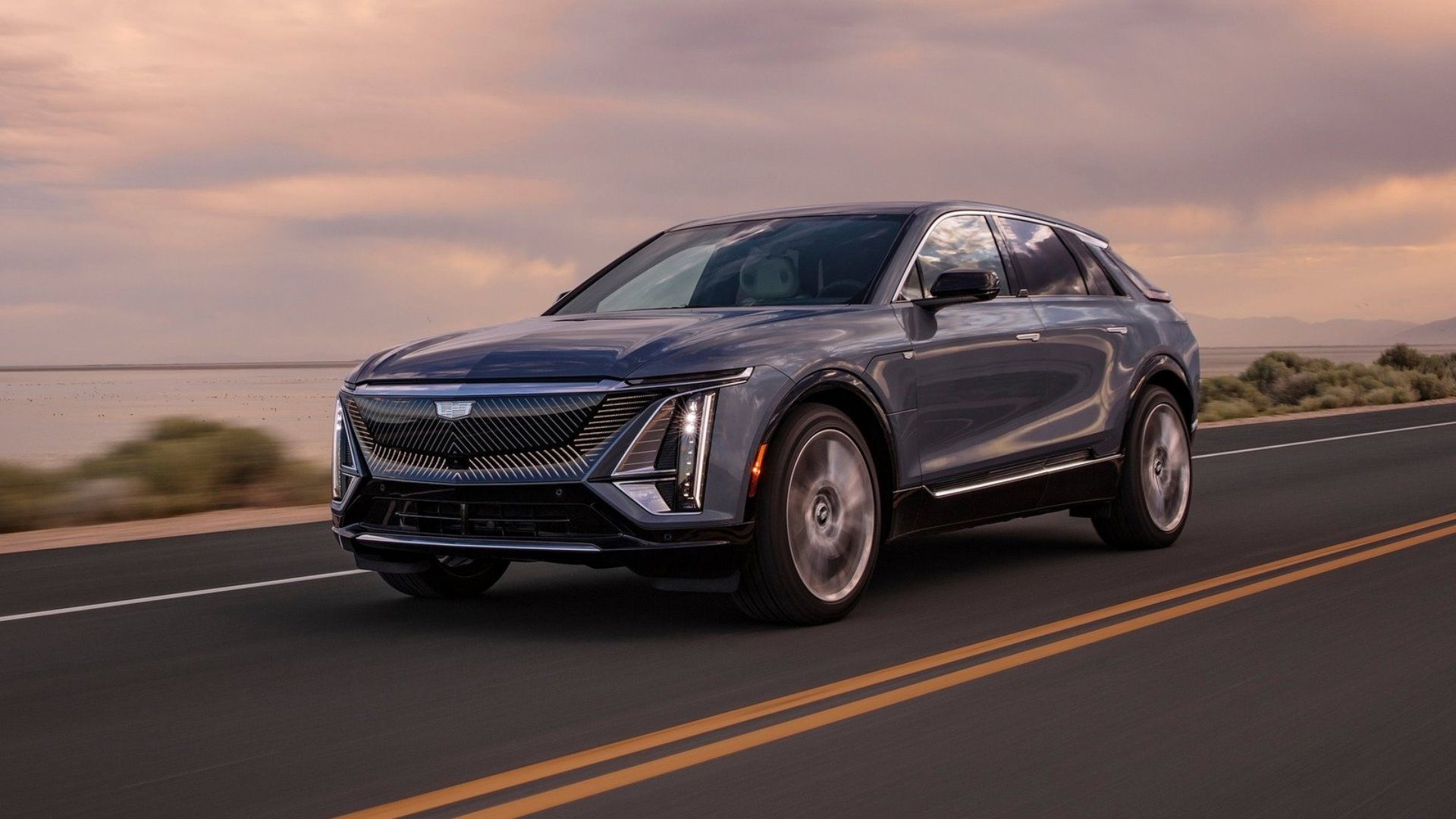 Silver Cadillac Lyriq front-quarter driving