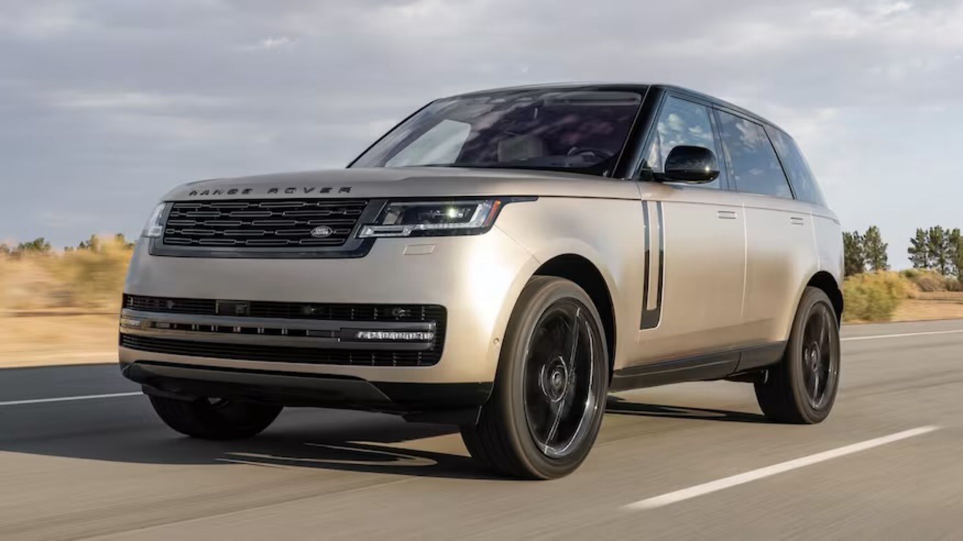 2024 Land Rover Range Rover Autobiography in copper posing on highway