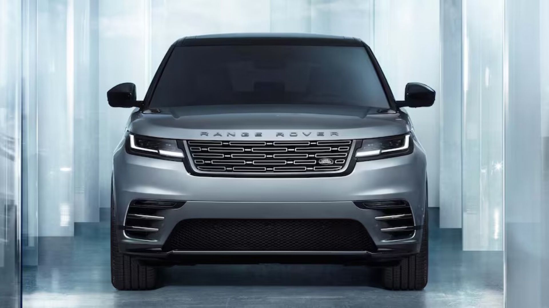 2024 Land Rover Range Rover in blue-gray posing in studio