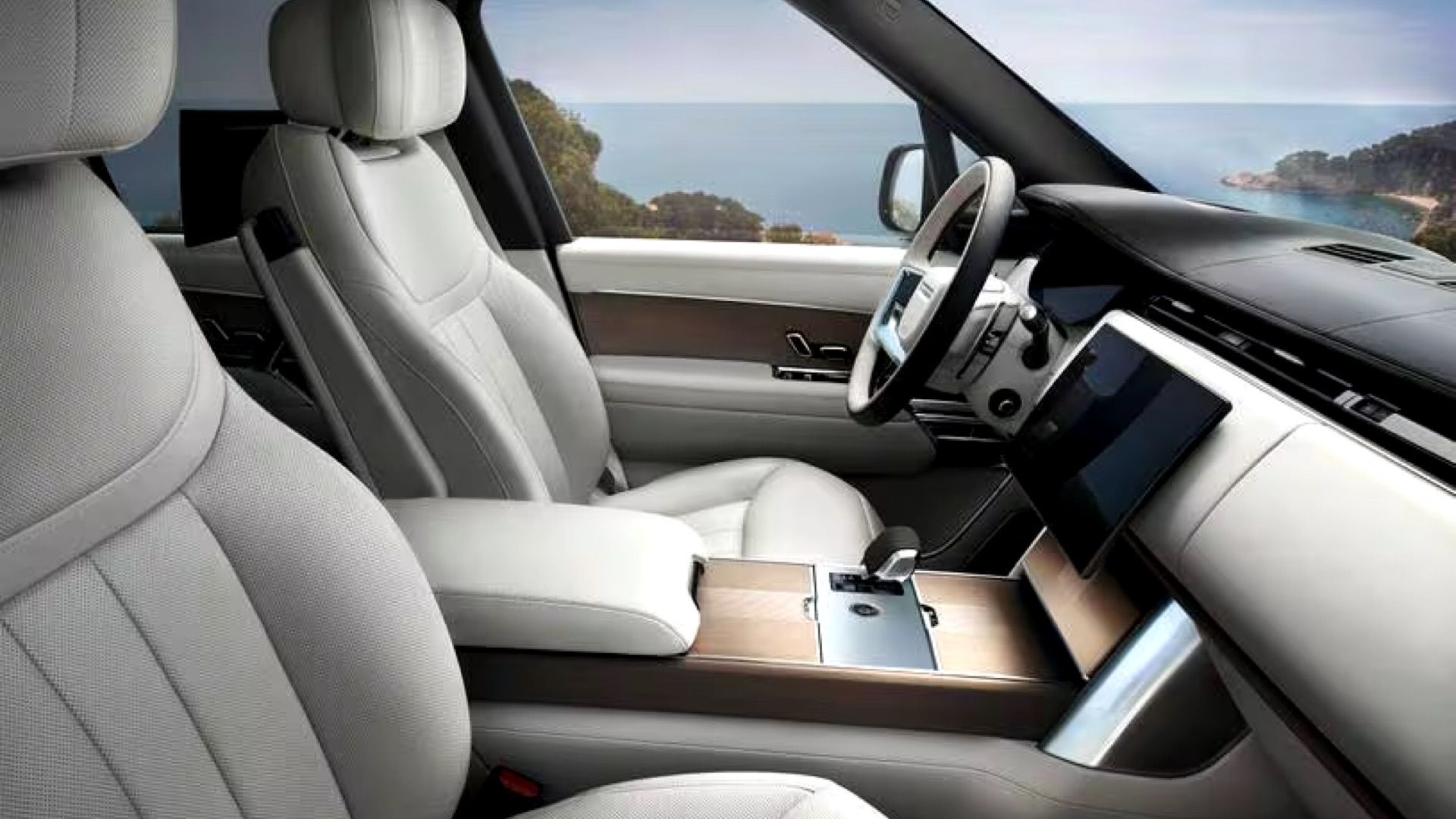 2024 Land Rover Range Rover interior Showing steering wheel, front seats, central console, and heads up display