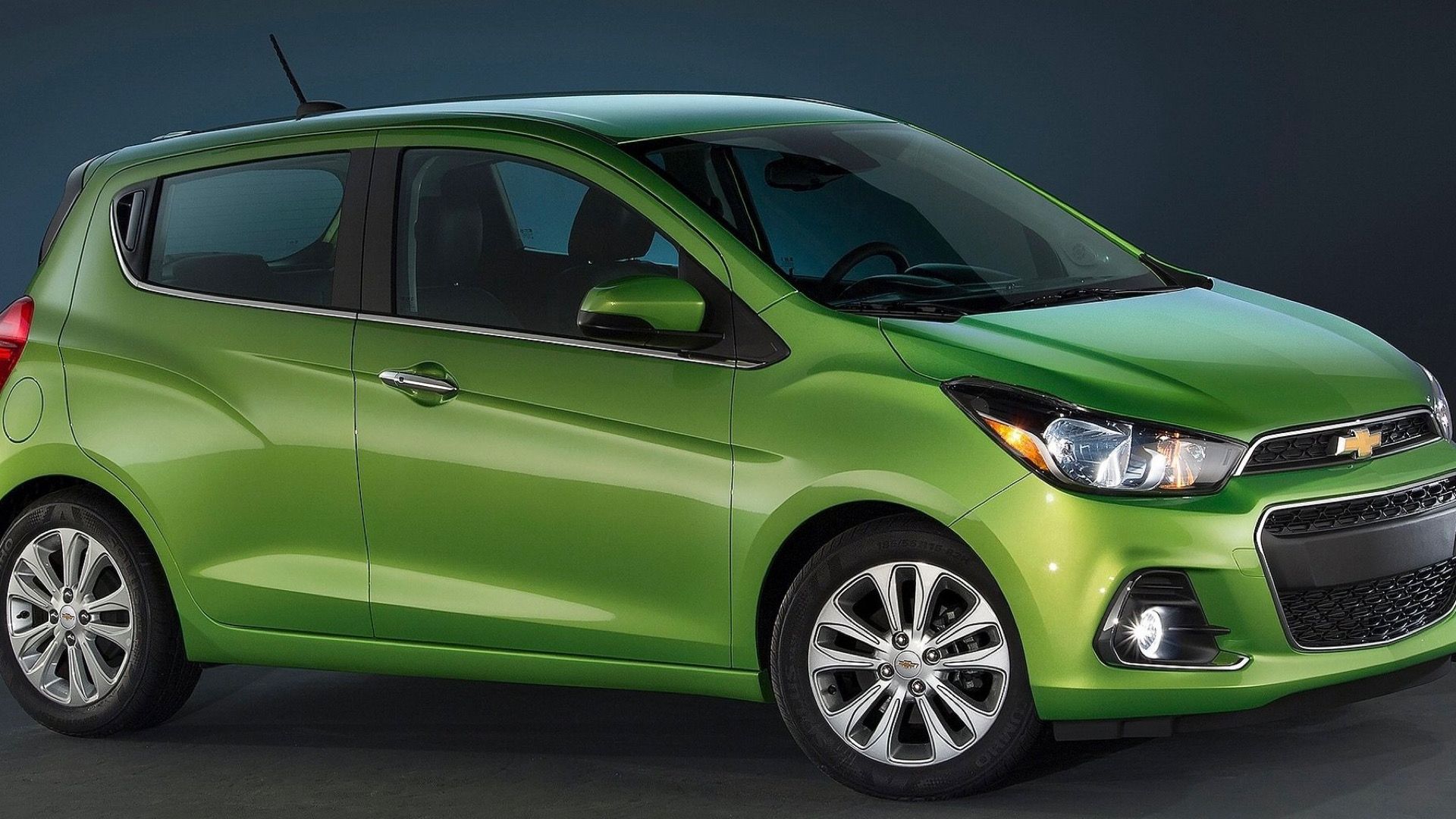 2016 Chevrolet Spark EV In green posing in studio
